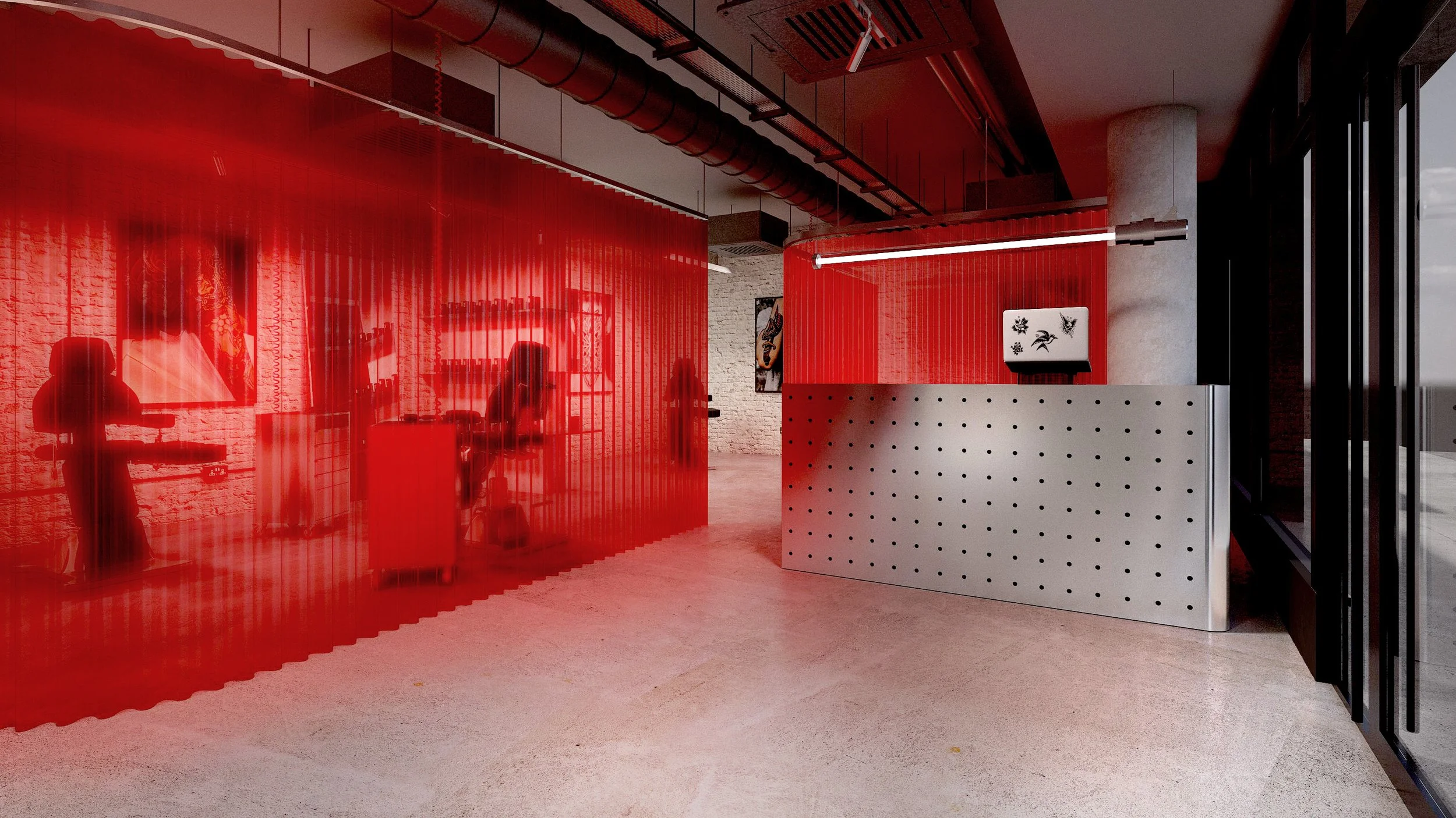 Reception area at Inkhaus Tattoo Studio Berlin featuring perforated metal desk and red curtain partition.