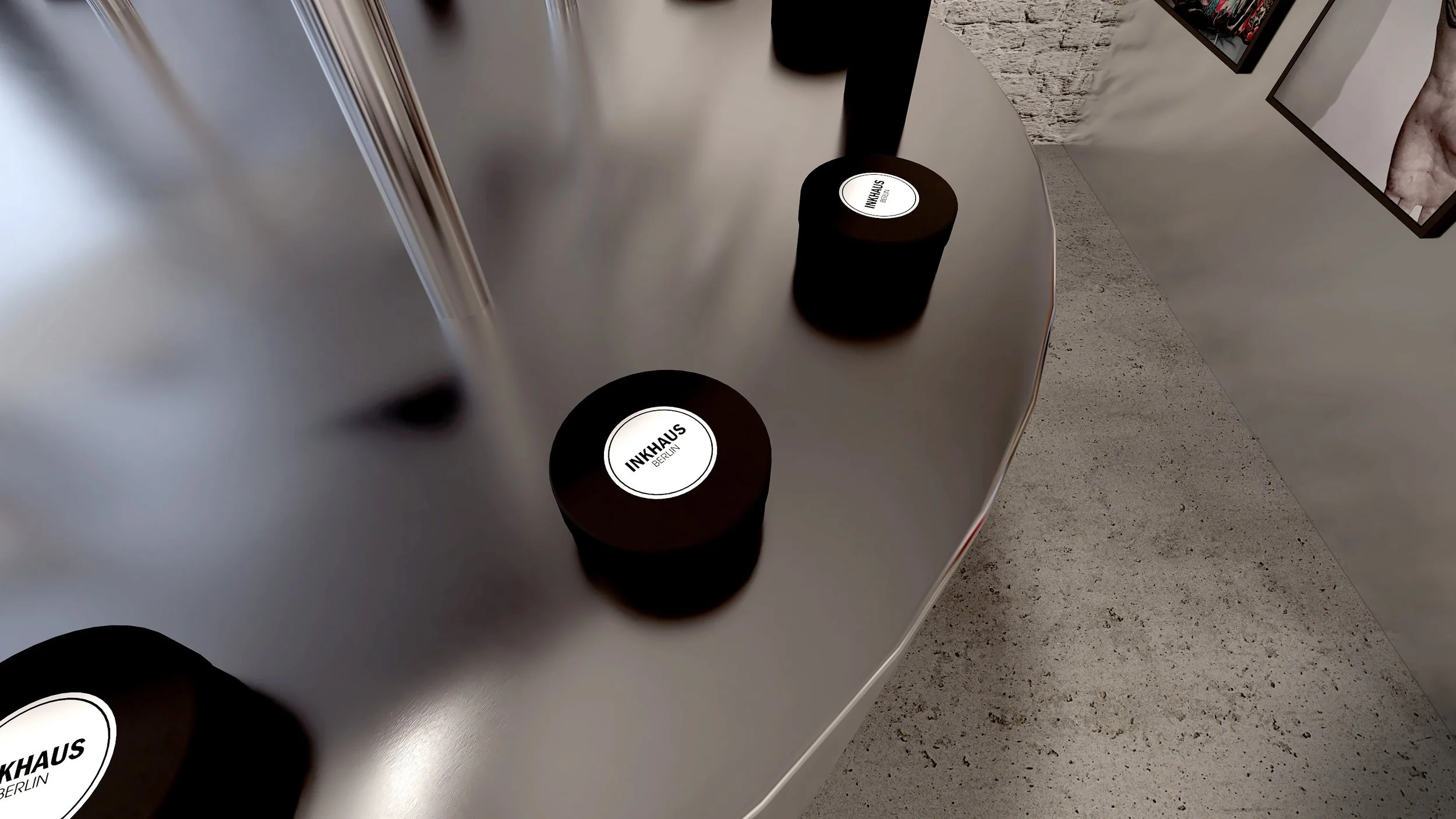 Inkhaus Tattoo Studio Berlin interior detail showing custom black branded product set against polished metal surfaces.
