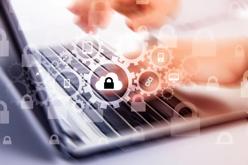 Data security specialist backups laptop with secure code