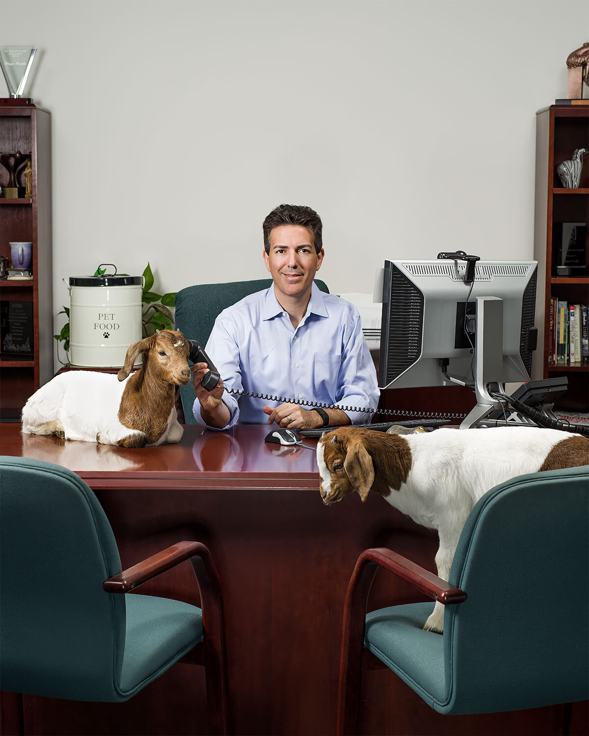 Former Humane Society CEO Wayne Pacelle works with animals