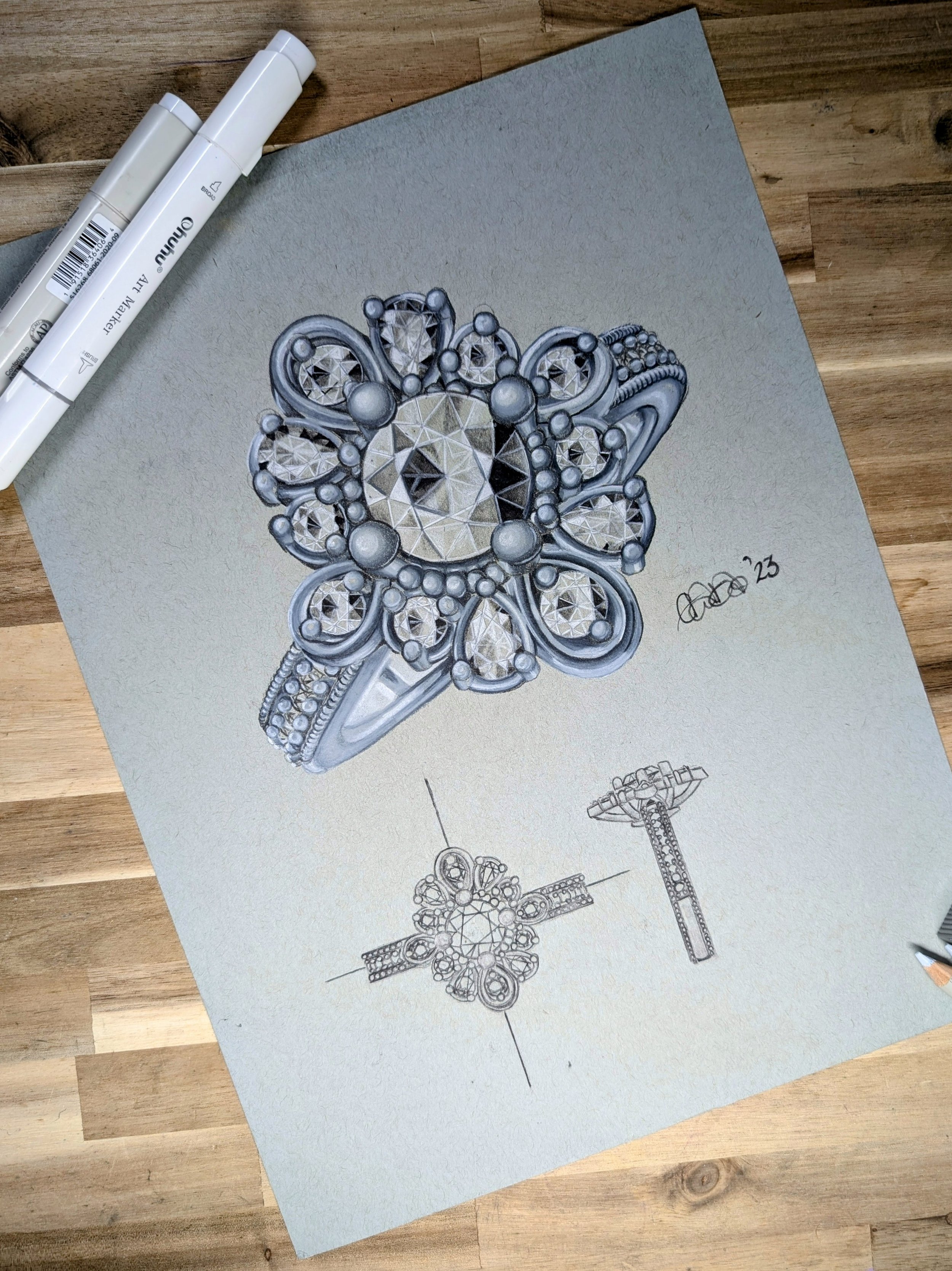 Detailed sketch and rendering of a diamond ring with a flower-shaped cluster of diamonds, shown from multiple angles on a gray background with two white markers nearby.