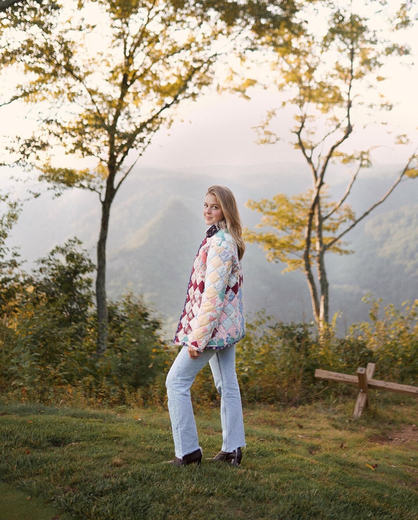 @samanthavarvel outshining the mountaintop views! 🌞✨ She wears our classic chore coat in a beautiful patchwork pattern 🫶 #handmade #quiltcoat #quiltedjacket #slowfashion