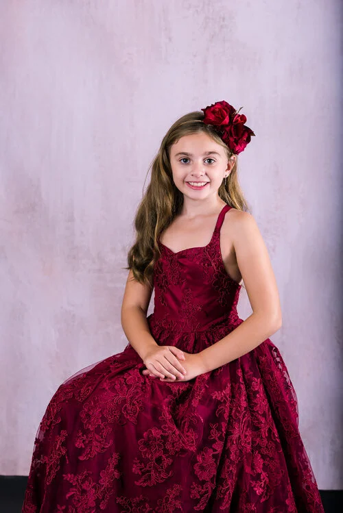 9+year+old+posed+for+a+portrait+at+Seraphine+photography+Studio+in+Brinley+Couture+Dress+-.jpg
