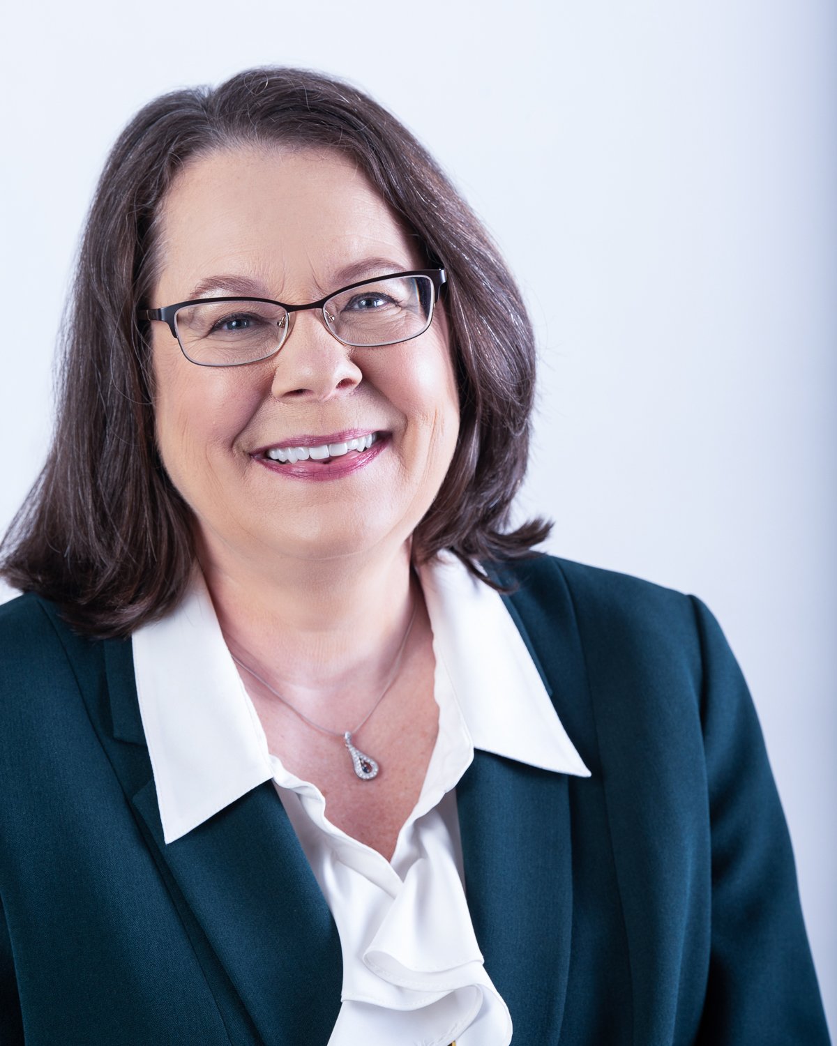 Professional Headshot of a woman in a dark suit in real estate-5615.jpg