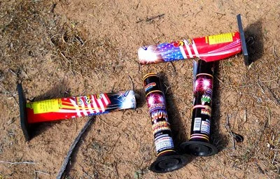 spent fireworks trash on ground - photo by Hadley Paul Garland