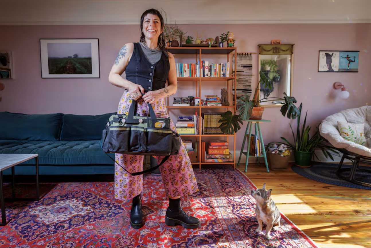Marlena Masitto of Philly Neat Freaks posing in her South Philadelphia home for a Philadelphia Inquirer feature about decluttering and organizing.
