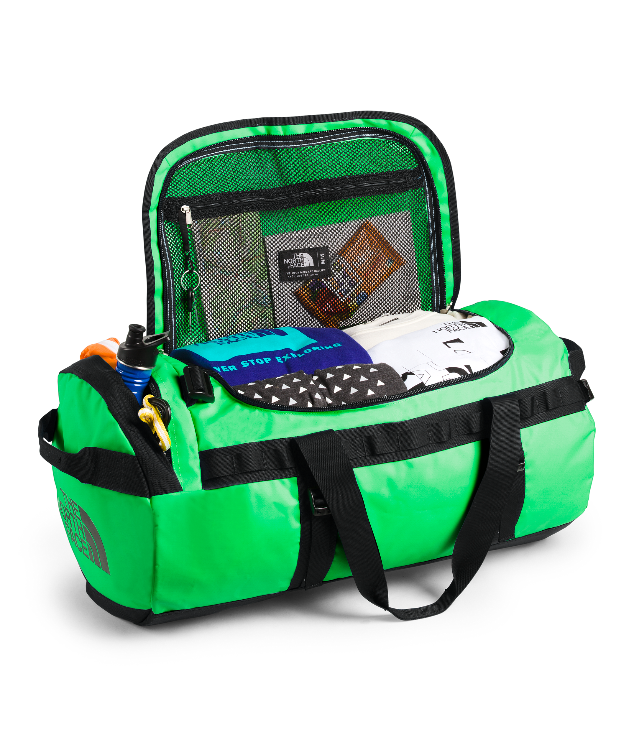 Open green North Face duffel bag with clothes, water bottle, and travel essentials visible inside.