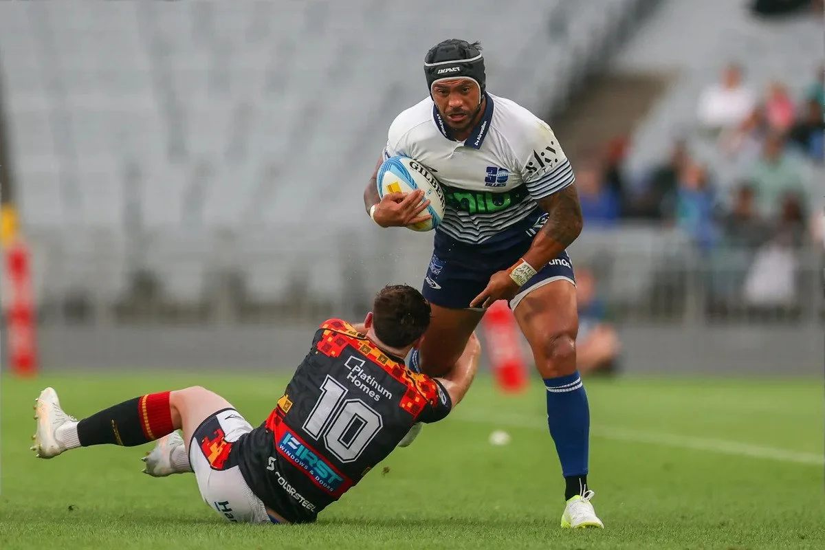 NARROW LOSS FOR BLUES IN SEASON OPENER