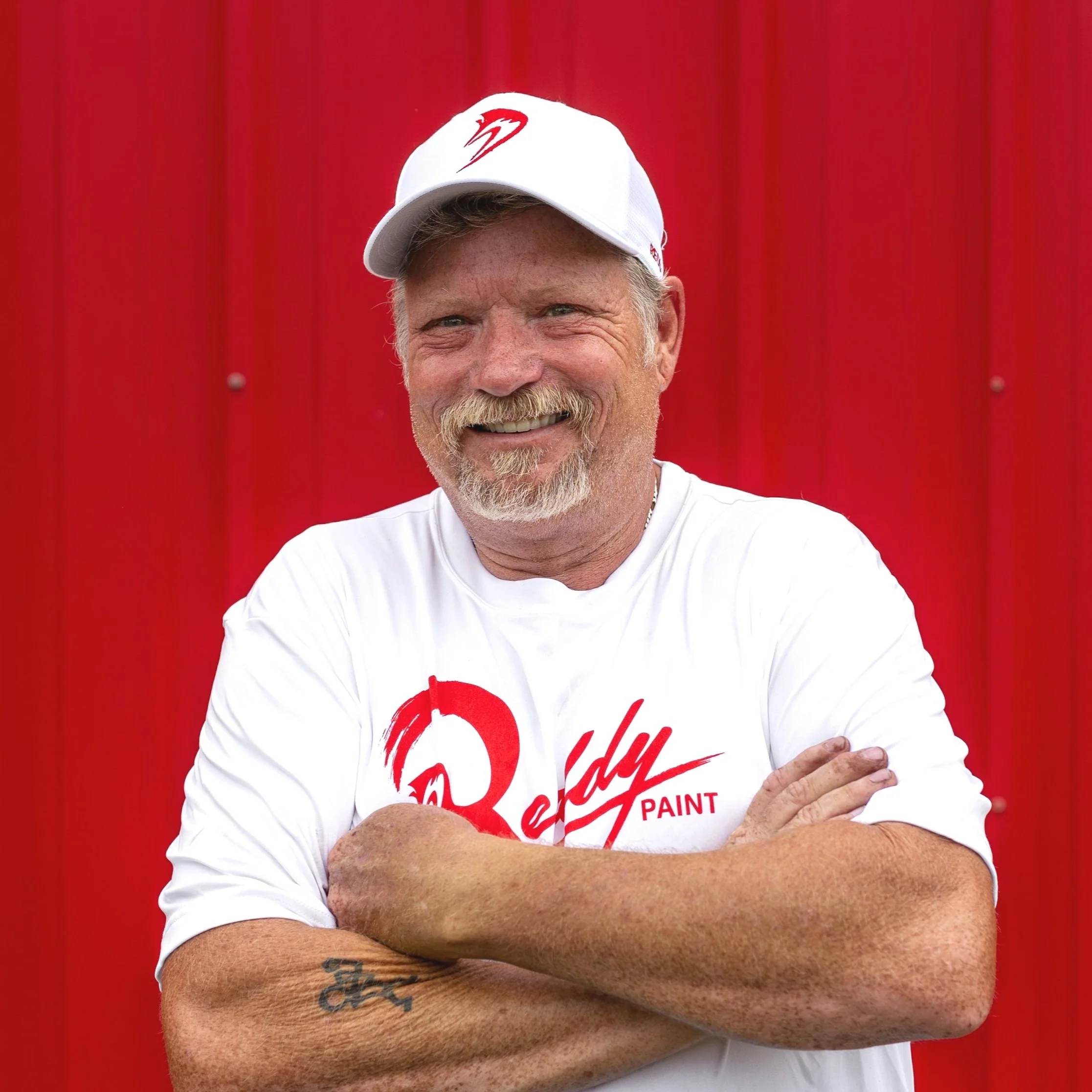 Paint brush sitting on a paint can.