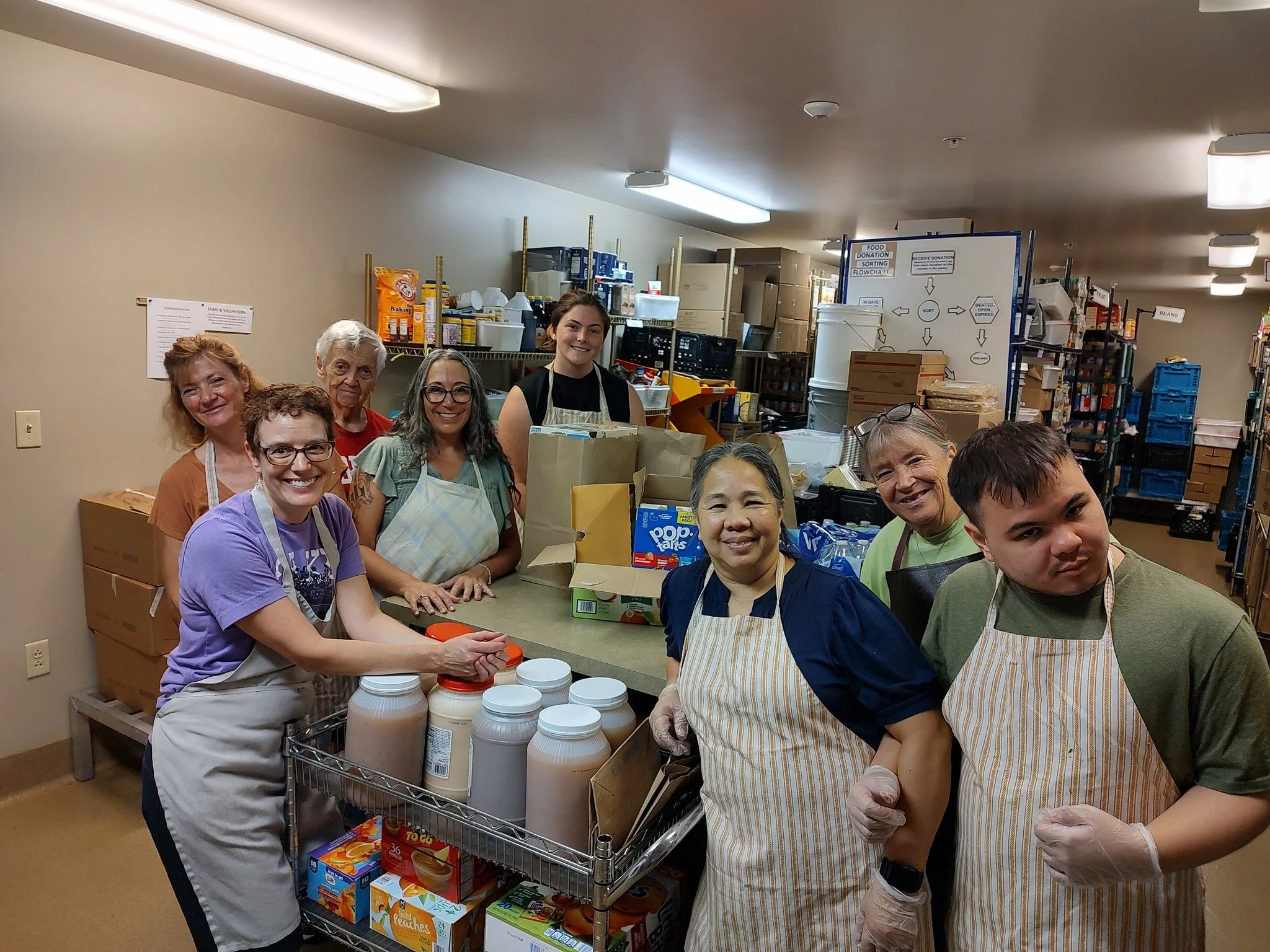 Shout-out to the first shift of Friday volunteers for their hard work. They chopped mushrooms, onions and garlic, prepared a side dish for this evening's meal, portioned food into take home containers, shelved donations, folded laundry, sanitized the
