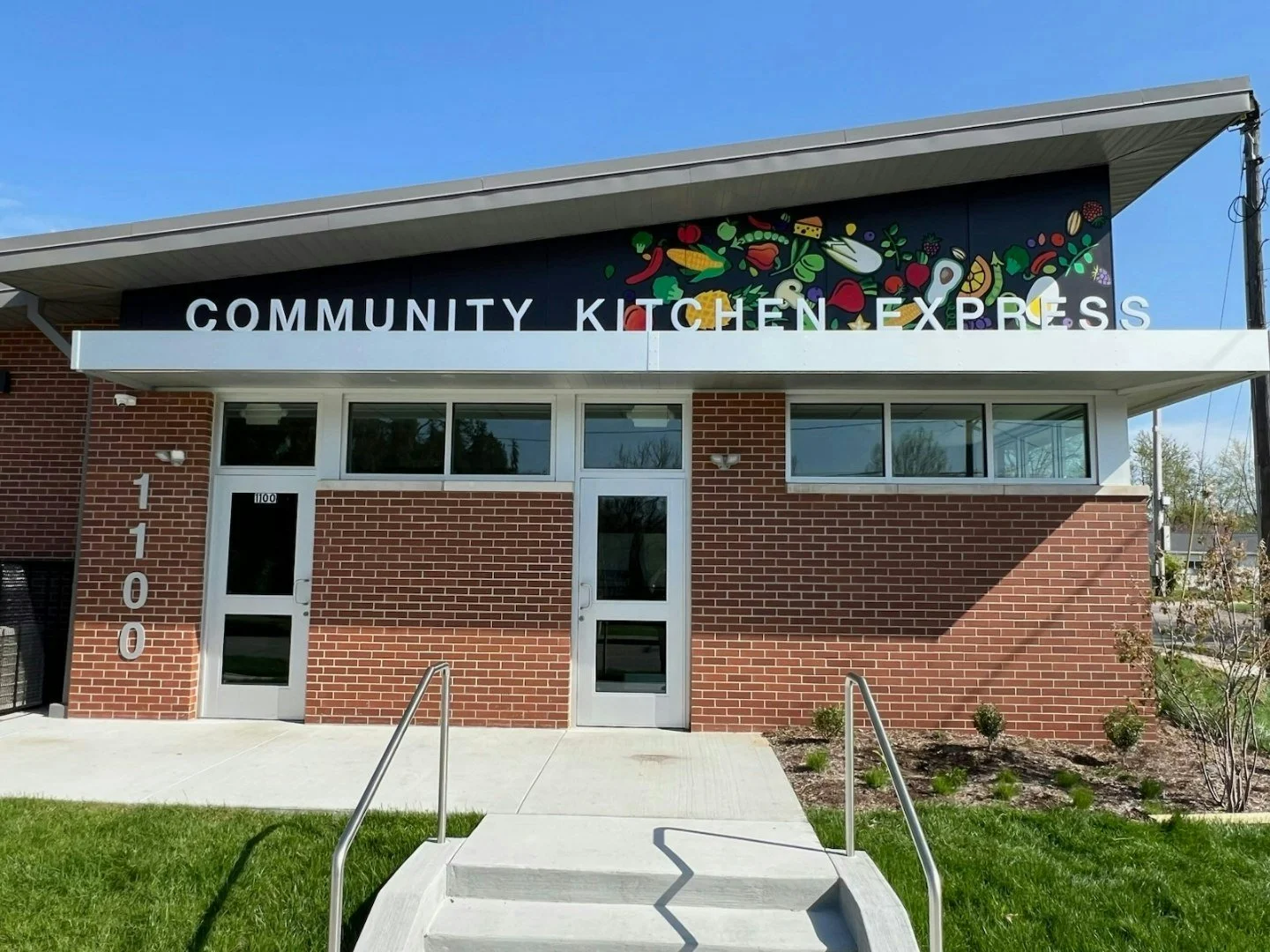 Our Community Kitchen Express location is located at 1100 W 11th St. We serve both warm and reheatable carryout meals to anyone in need from 4-6pm, Mon-Sat. Each person may receive one warm and one cold, reheatable meal, each. We serve an average of 