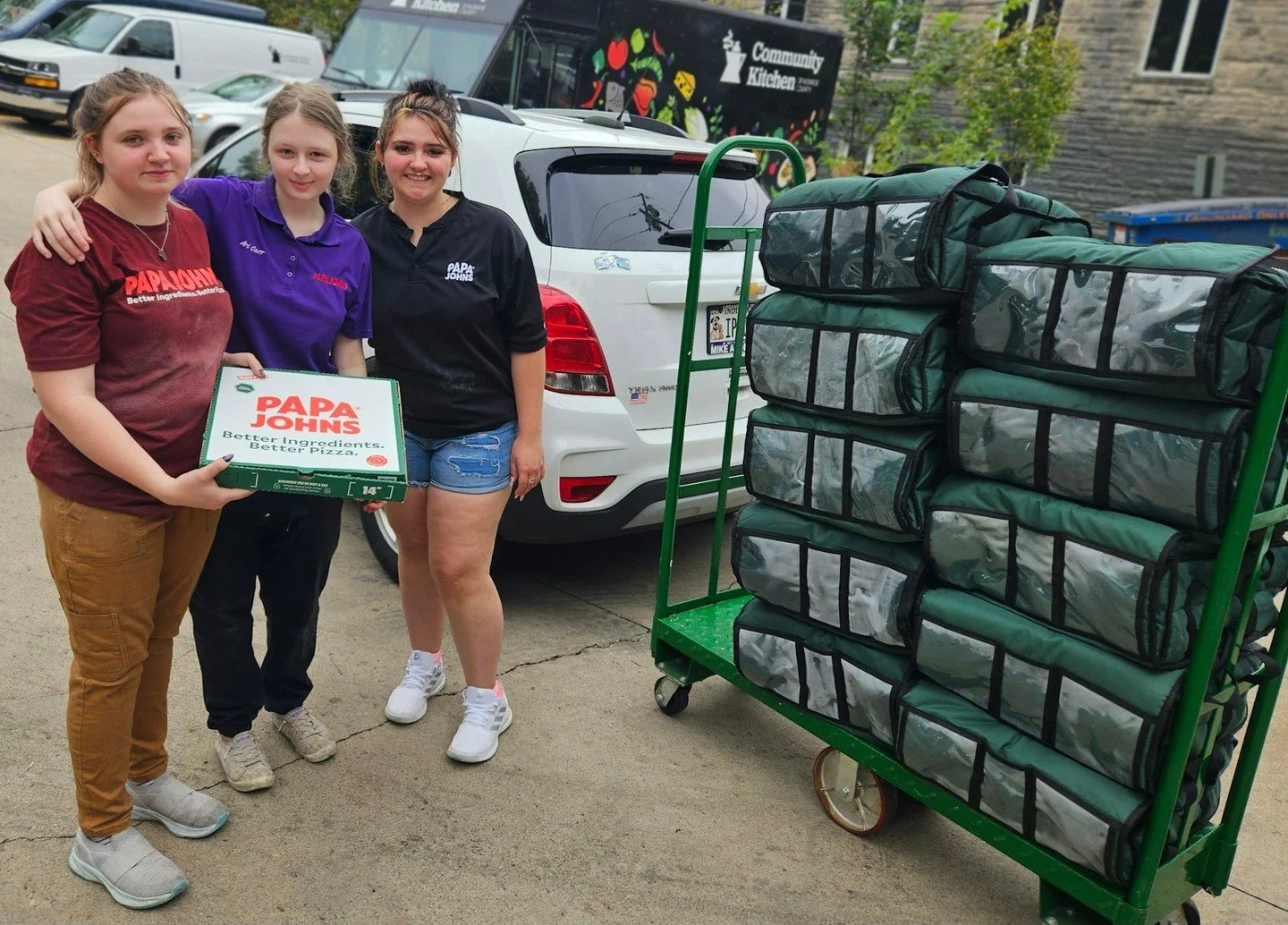 Last night our patrons all got to enjoy fresh, hot pizza from the local Papa John's locations. We are so grateful to them for the 90 pizzas it took to feed all of the patrons at our Rogers and Express locations, and the food truck sites. Papa John's 