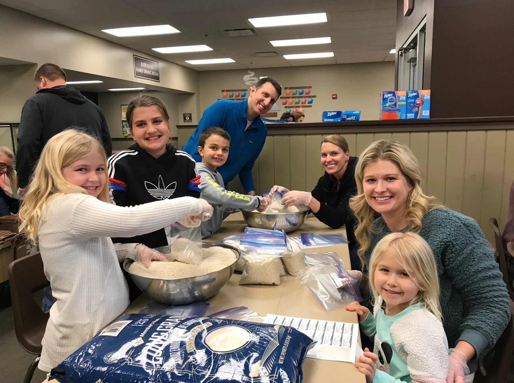 It's time for Family Day at Community Kitchen! Join us on Sunday, October 26th from 3:00-5:00, at our main location on Rogers Street to help with a portioning project that will be included in our Backpack Buddies program. Family Day is for families w