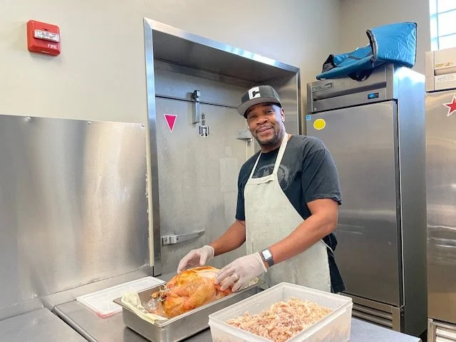 Thanksgiving week is always busy here at Community Kitchen. In addition to the usual meal prep tasks that our volunteers undertake, they help get the turkeys ready for Thursday. For several days prior to Thanksgiving, we roast turkeys in batches and 