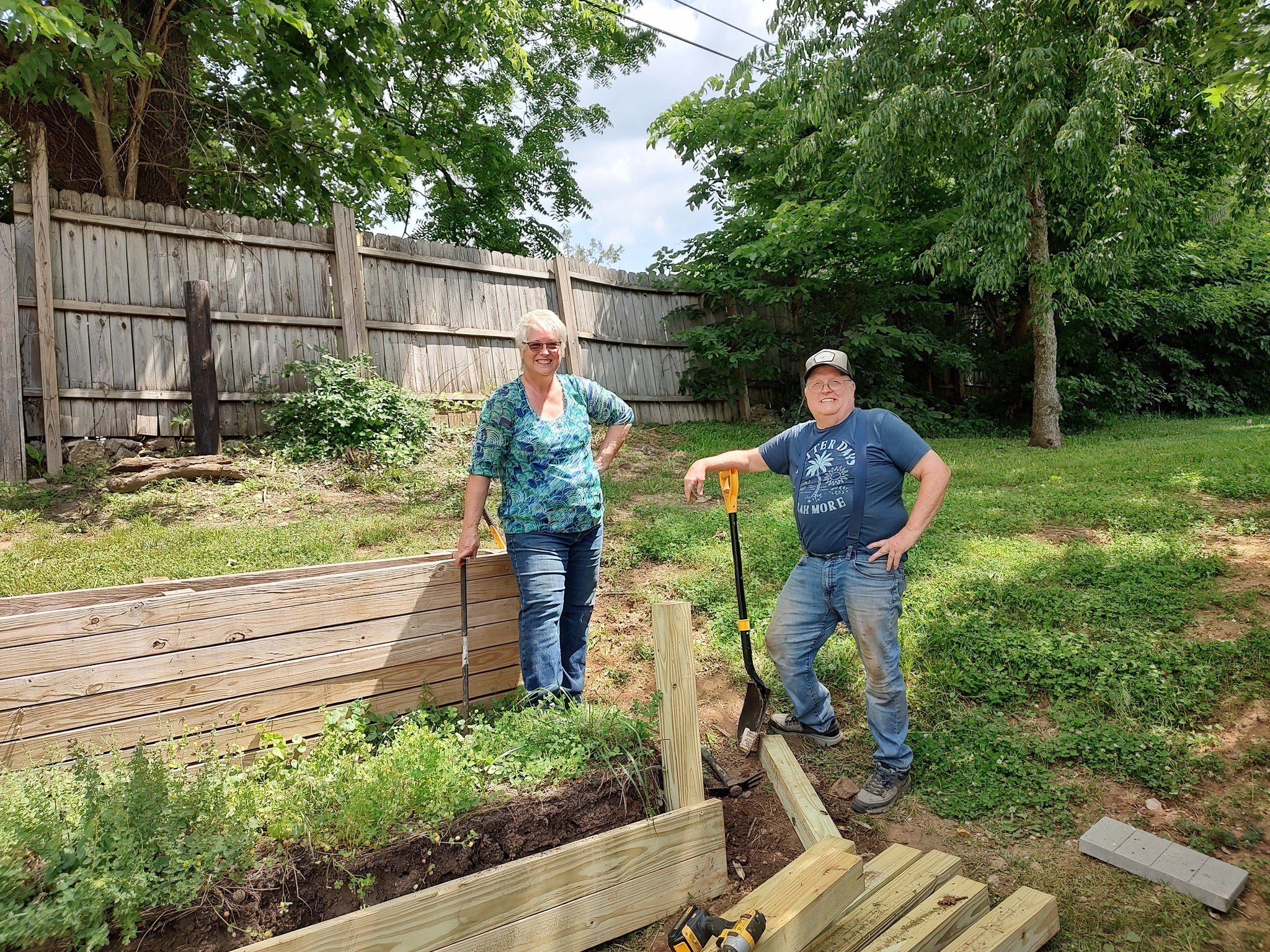 We owe a big thank you to volunteers Scott &amp; Karen Garrett for rebuilding our raised garden beds. They were in sad shape when Scott &amp; Karen began tearing out the old wood and replacing the boards with new ones. The herbs that already came up 