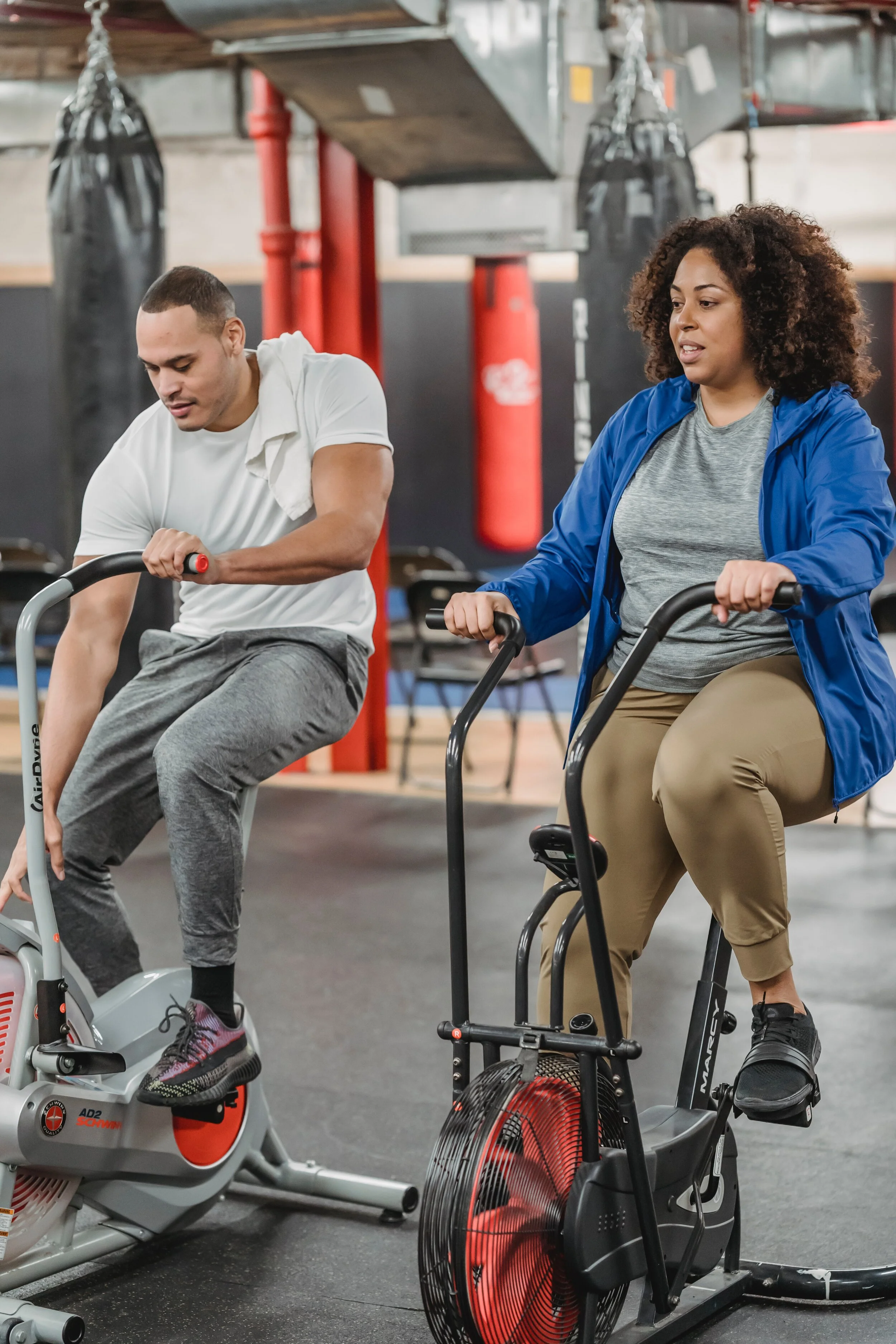 Black man and woman on a bike.jpeg