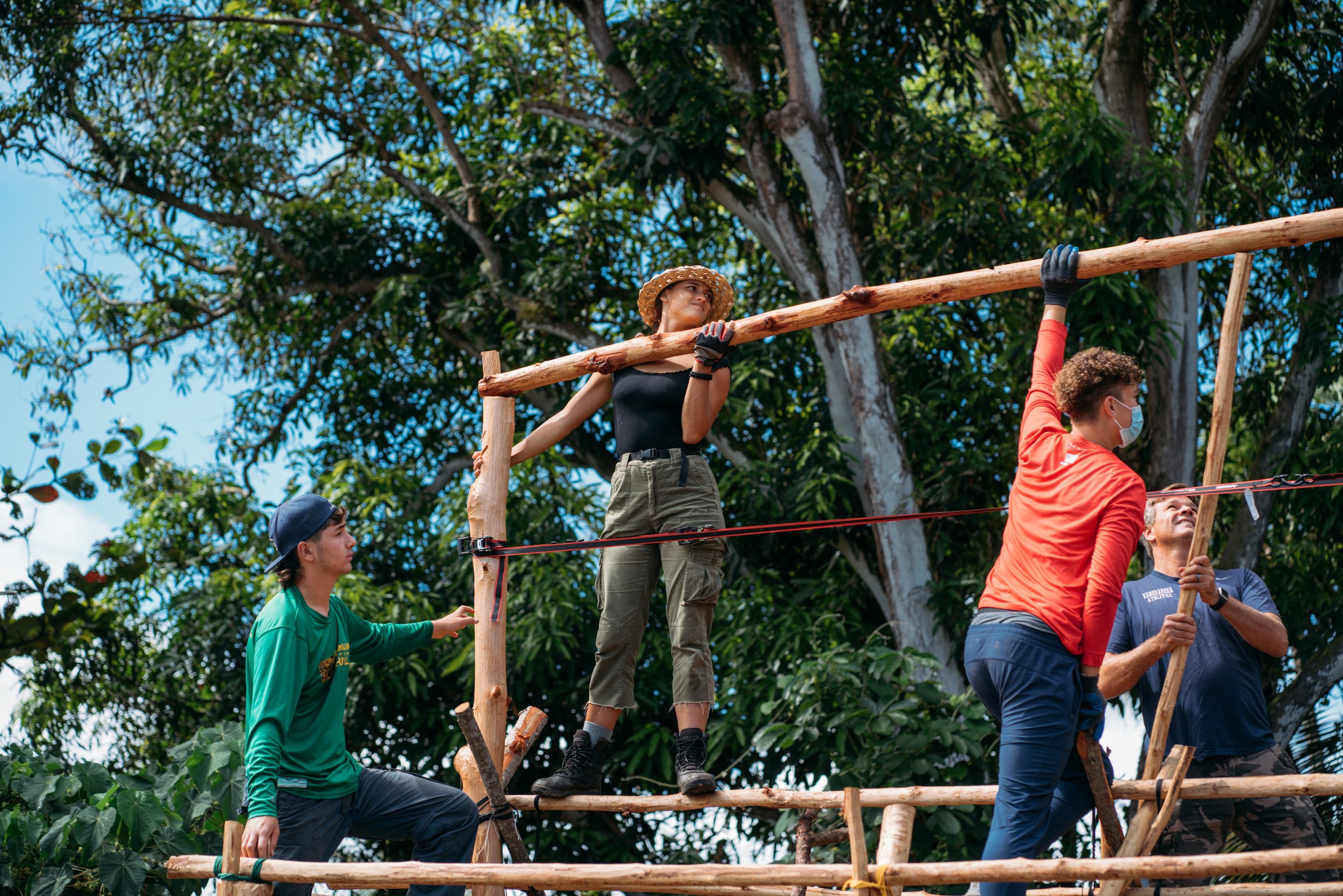 Maunawila Opio Constructing the top of the Hale.jpg
