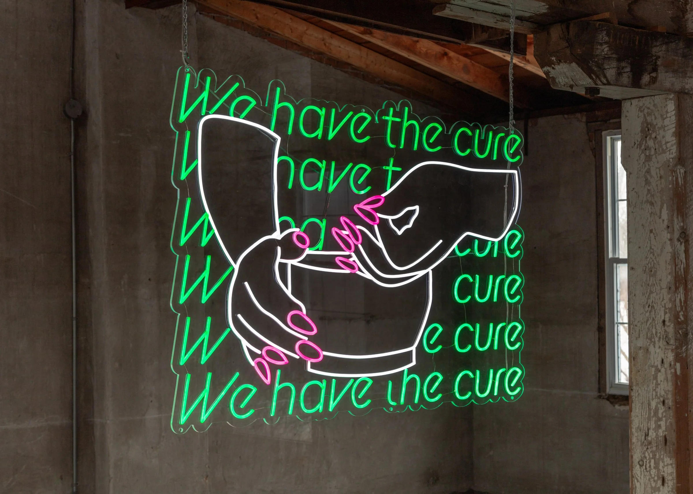 A neon LED sign with the phrase “We have the cure” in neon green repeated behind an image of a woman's hands with neon pink nails holding a bowl. 