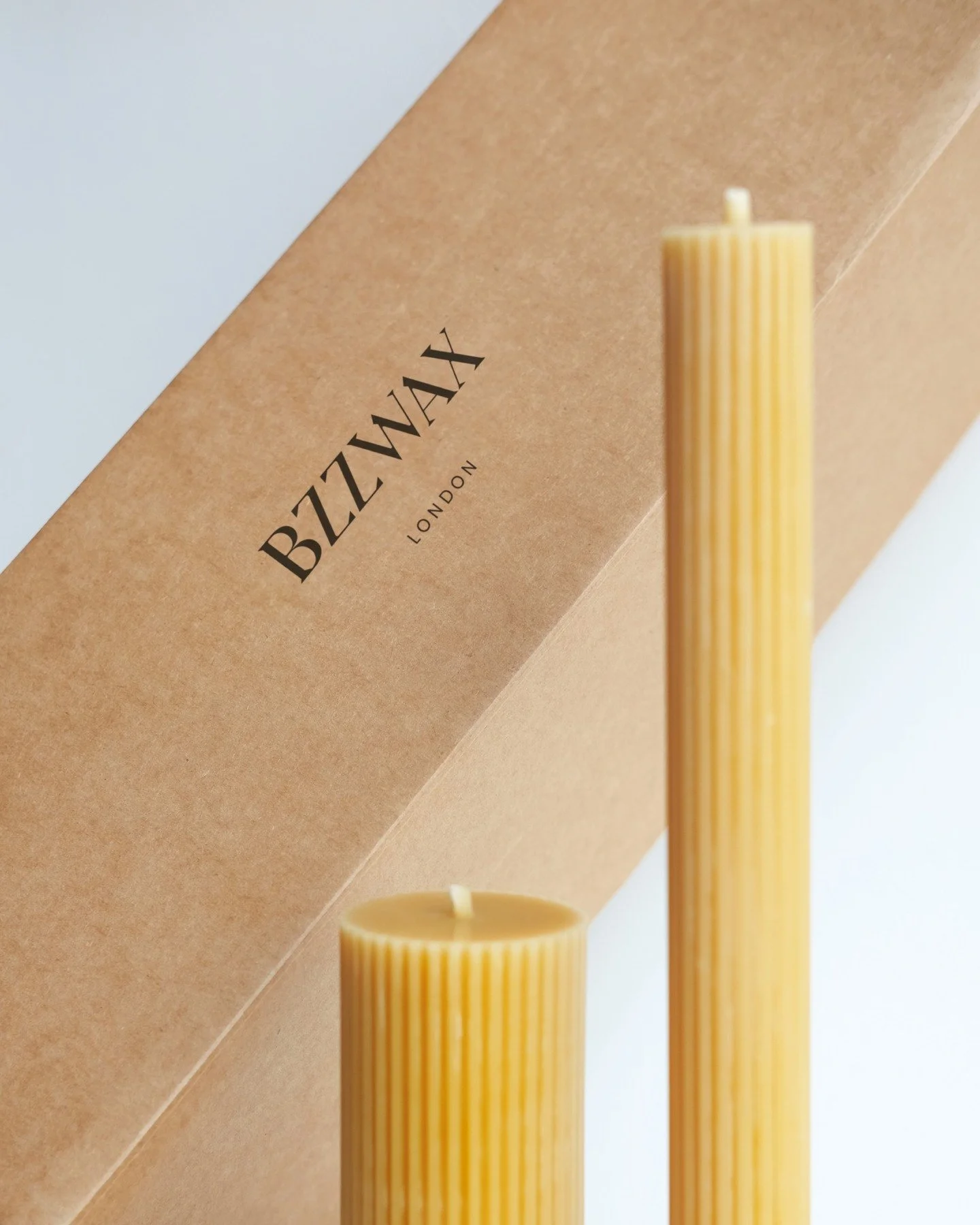 Logo for Bzzwax, a London-based candle maker that prides itself on creating candles with ingredients that come straight from mother nature, using organic beeswax.⁣
⁣
Inspired by the geometrical architecture of the beehive and the honeycomb the logo&r
