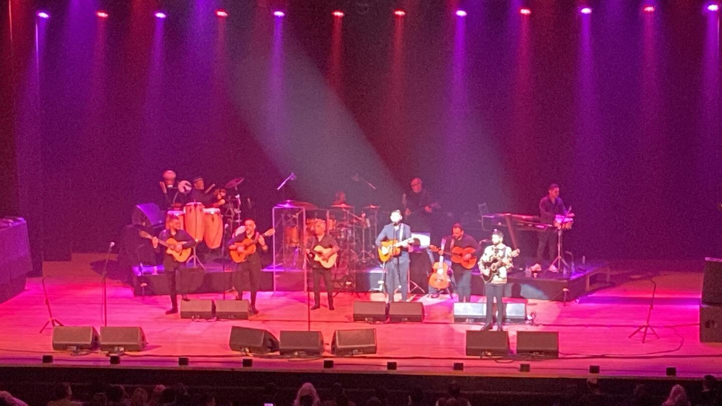 Gypsy Kings last night.  Not a word of English and nobody stayed seated.  Dudes walk out with SIX acoustic guitars, and went all out.  I could swear the soloist had six fingers on his right hand. 
They are known for songs, Bambaleo and Volare&rsquo;.