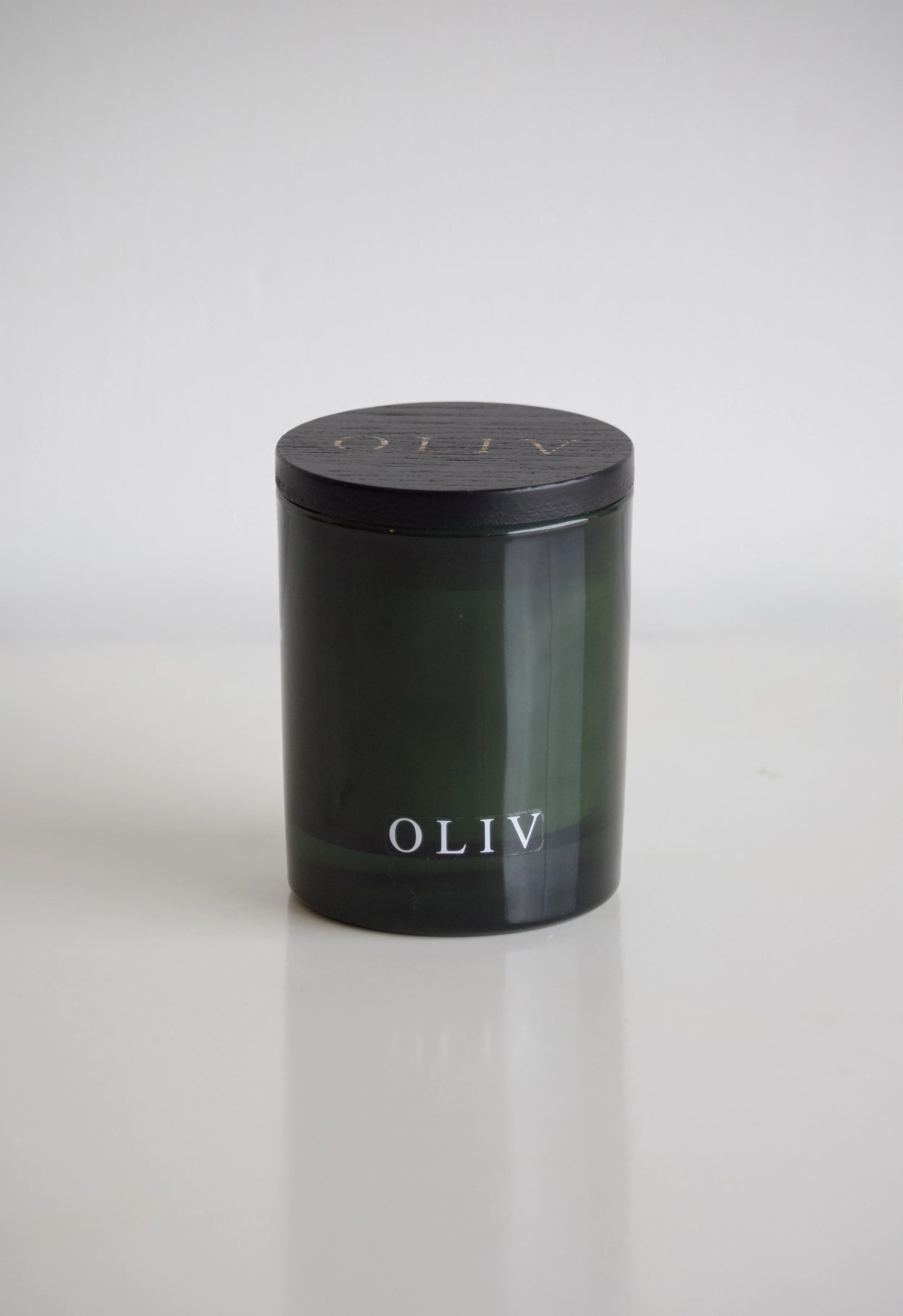 oliv single wick green candle.jpg