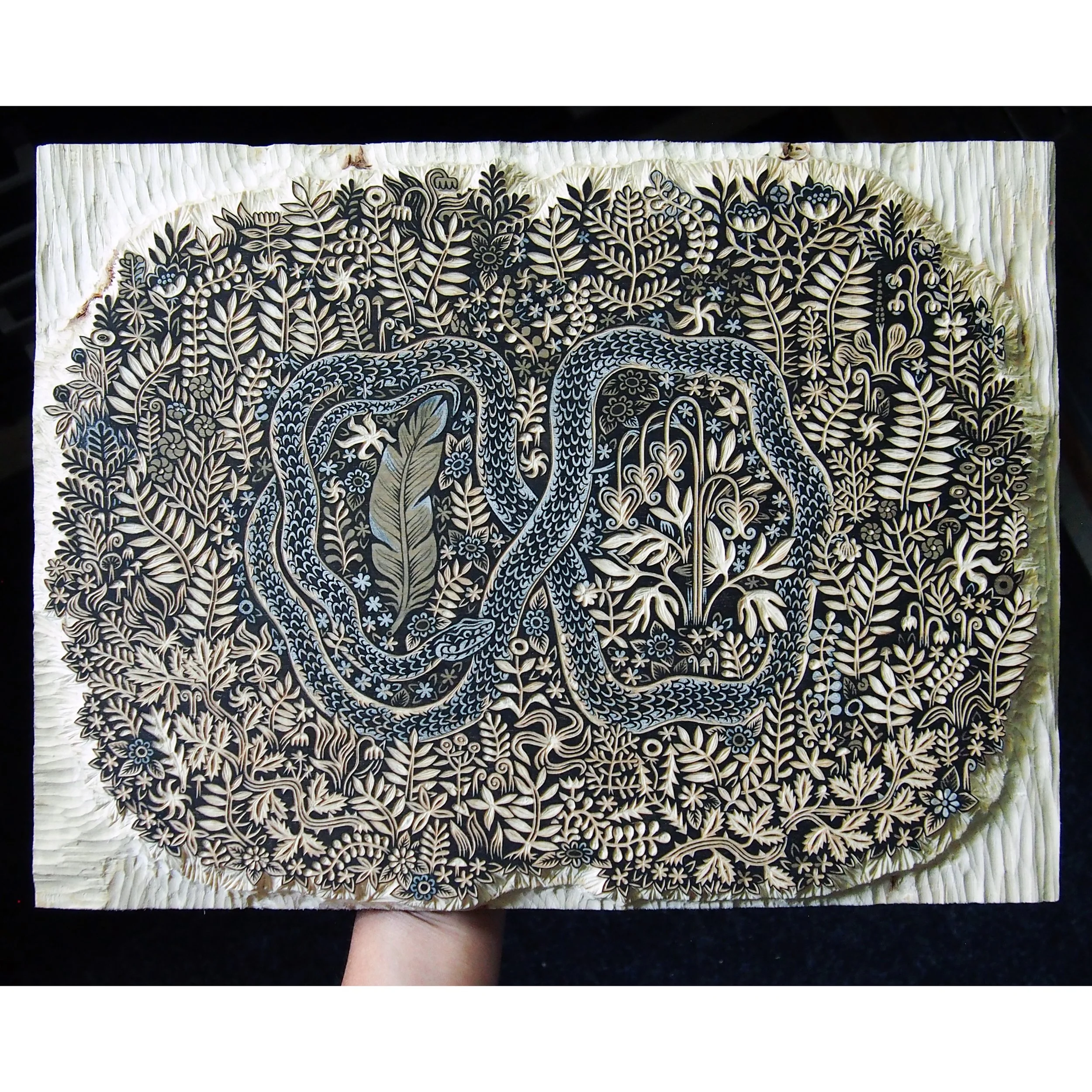 loopingserpent_carvingblock03_croppedSQ.jpg