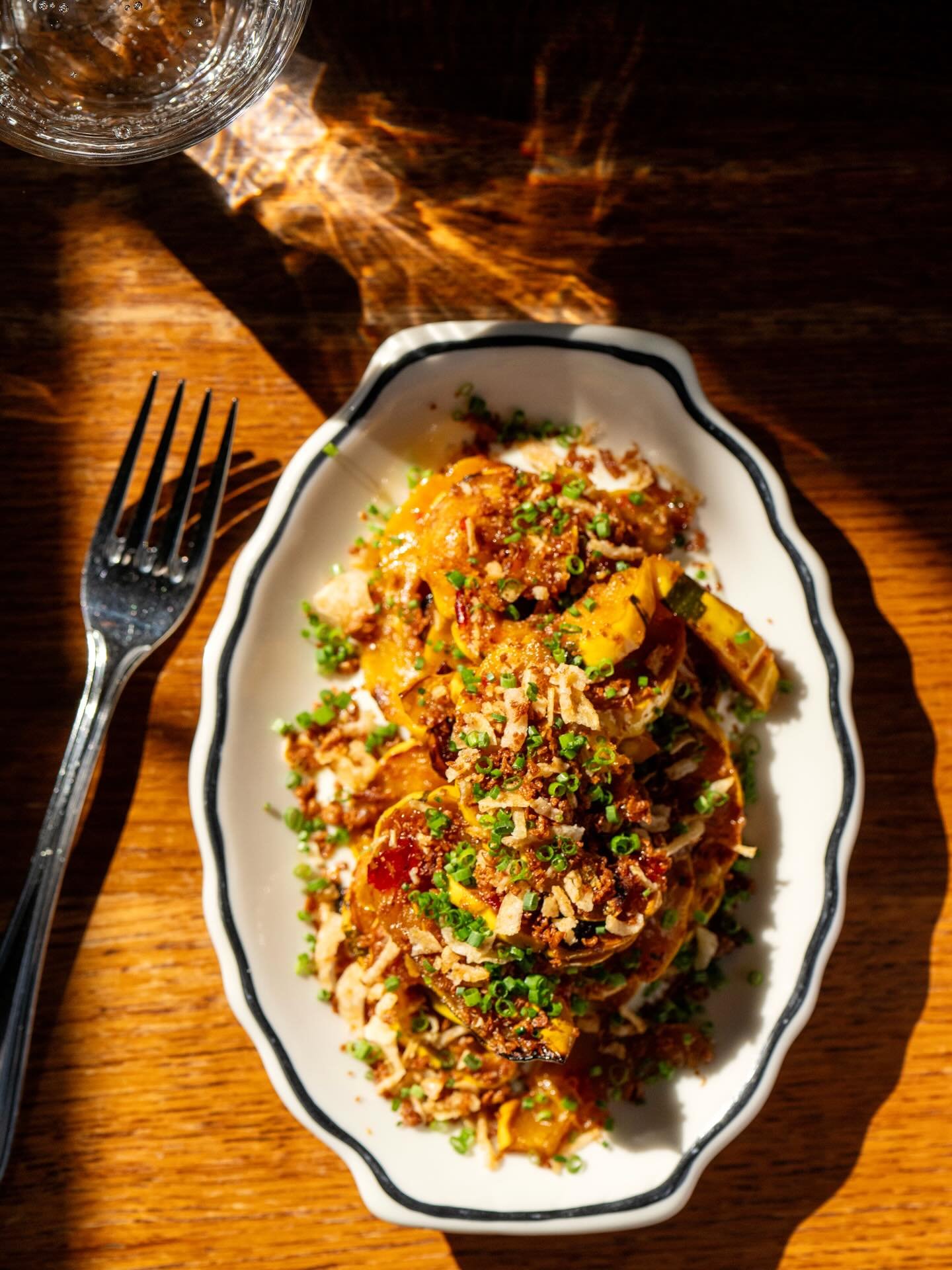 Grateful for this sunny January day 😎. Round out the meal with yummy veggie dishes like this Delicata squash with Gorgonzola dolce, Calabrian chili honey &amp; fried garlic. Open 4-9 ✌🏻.
