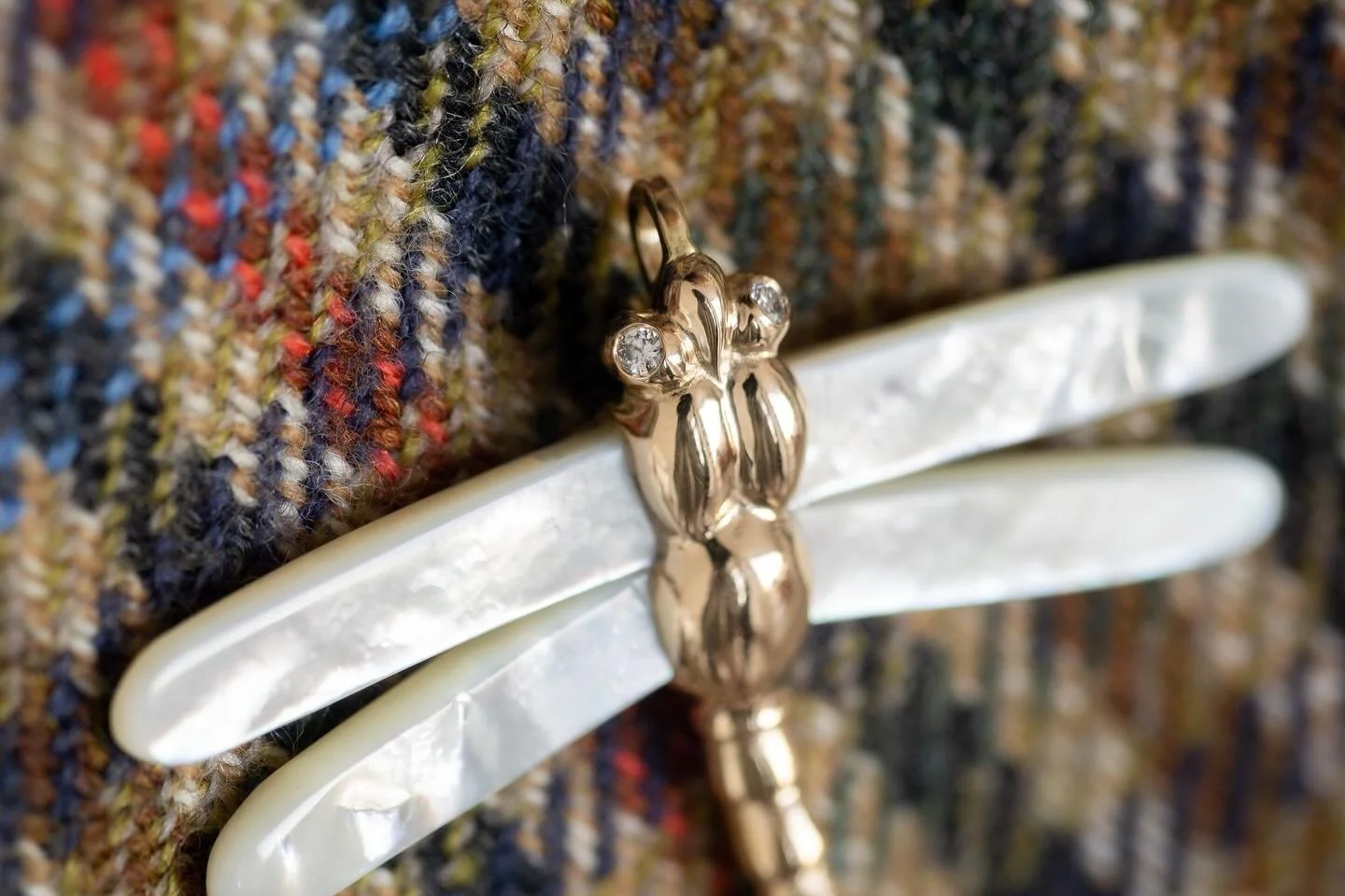 Grace in every detail. This exquisite lifelike dragonfly brooch and pendant, crafted in 18k gold with shimmering diamond accents and luminous mother-of-pearl wings, embodies elegance and natural beauty. A timeless symbol of transformation. One of two