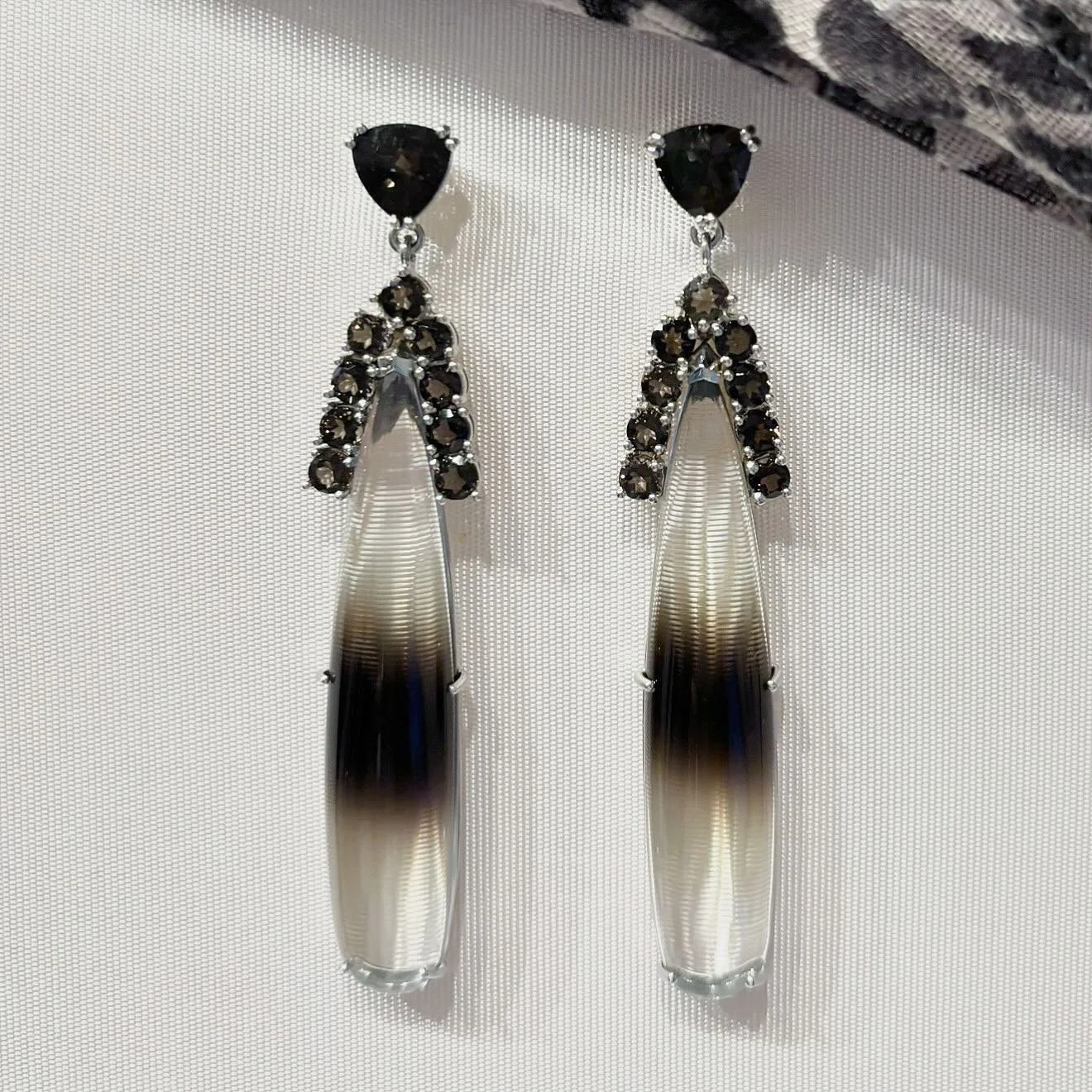 Working on some new pieces for this autumn&hellip; the latest: a pair of two tone smokey quartz drops crowned by round and trillion-cut smokey quartz stones. #smokeyquartz #twotonequartz
