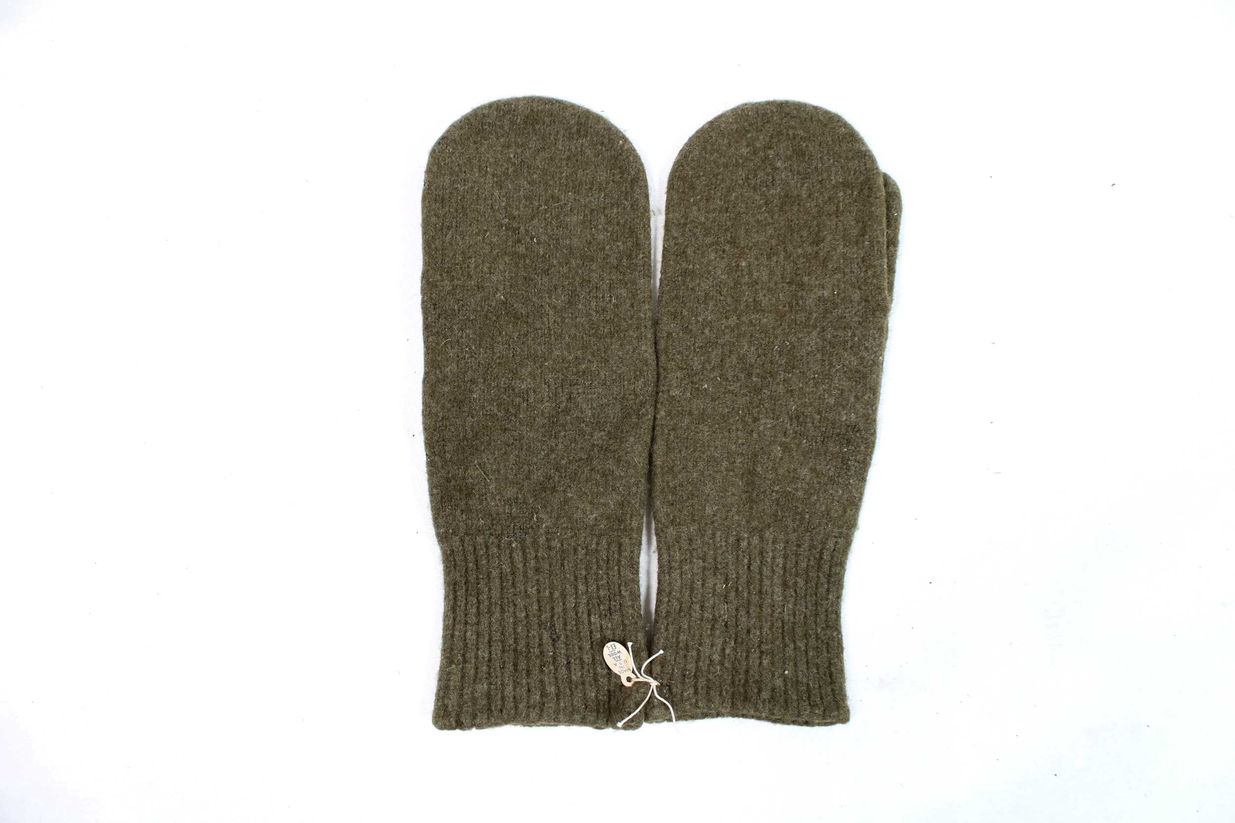Genuine WWII pair of US mittens, OD wool, with trigger finger. Type II with trigger finger located inside the palm. The index finger is left free to activate the weapon's trigger.