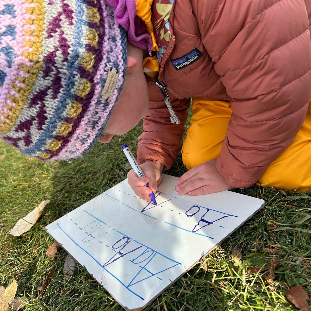 Practicing Letters in the Outdoors 🔤

At Calgary Nature Kindergarten we took some time to practice lettering and phonics in Confederation Park. 

We offer children whiteboards, paper, cardboard, clipboards, and different mark-making tools to allow c