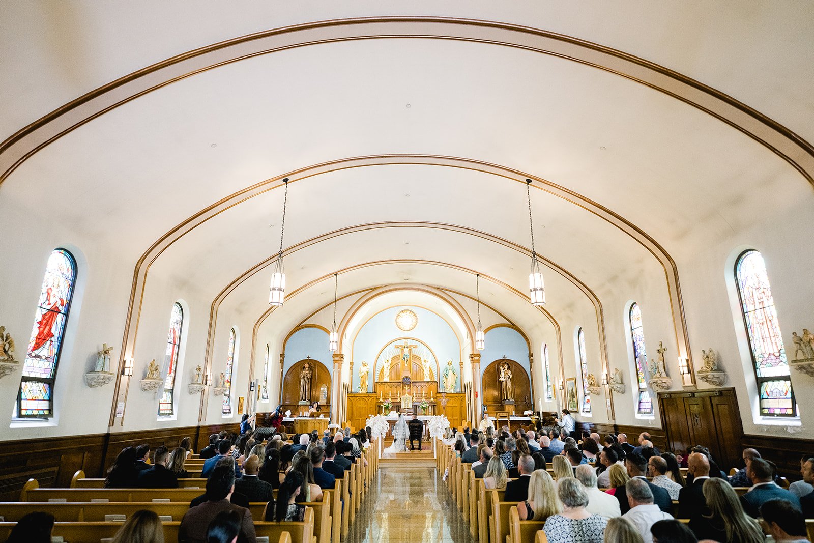 Couple weds in local parish, St. Francis of Assisi in Vancouver, BC.