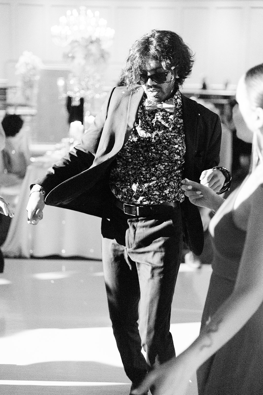 A hip young gentleman dances at a wedding at Swaneset in Vancouver,BC.  