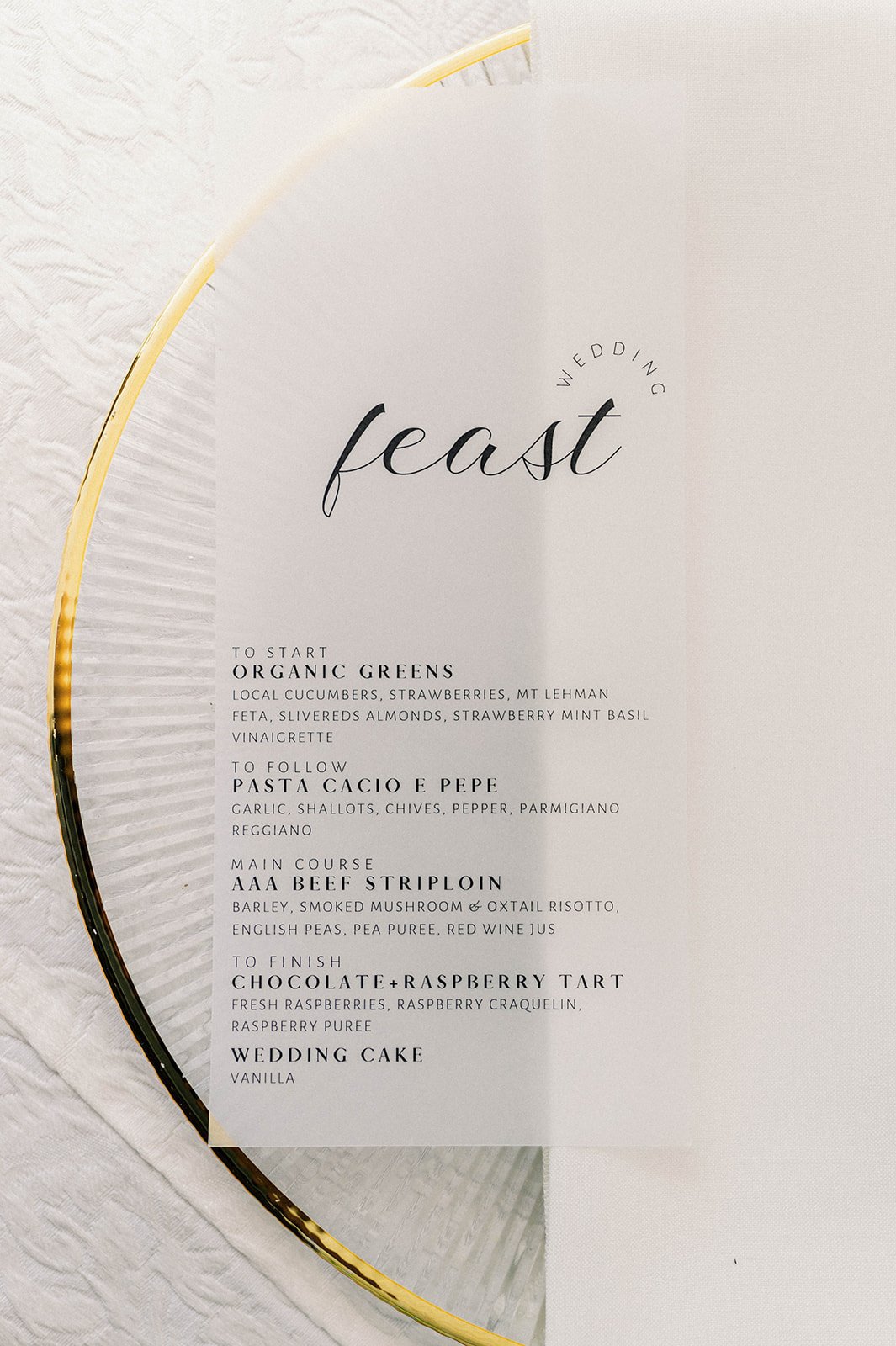 Wedding menu on golden encrusted plate promises feast