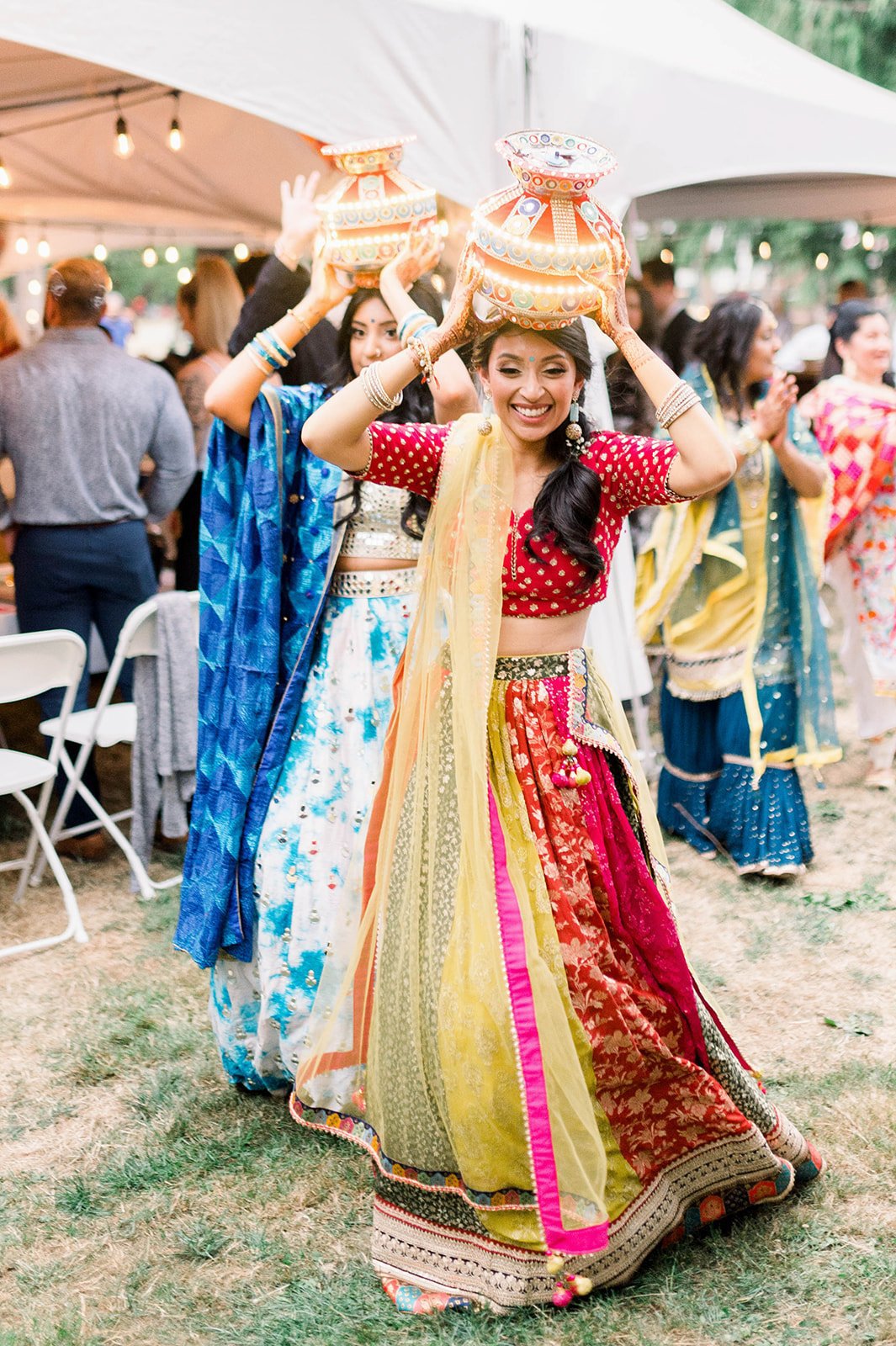Bride dances with khadaa for Jaggo ceremony before her Victoria BC Wedding.