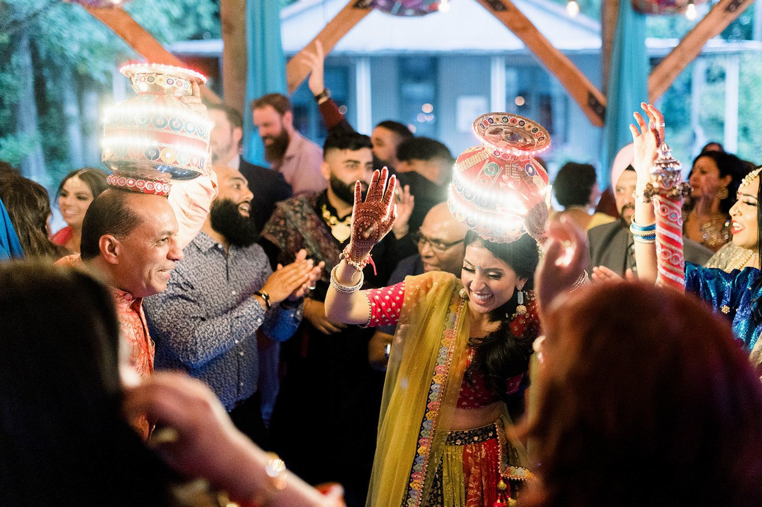 Bride Dances with khadaa and guests during her Jaggo for her Indian Wedding.