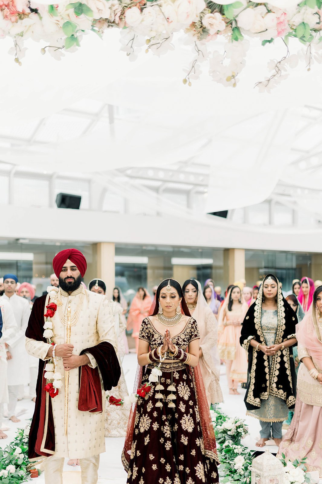 An South Asian couple walk laava laps in their wedding ceremony in Victoria BC 