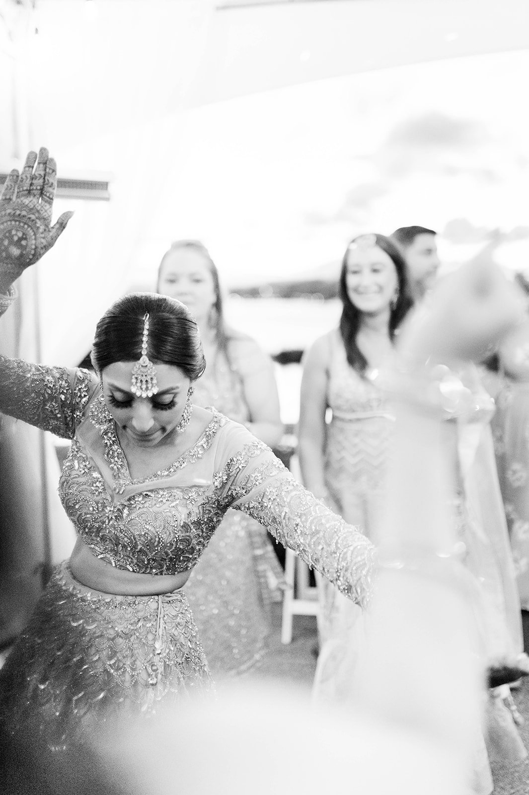 An indian bride dances at her reception in Victoria BC