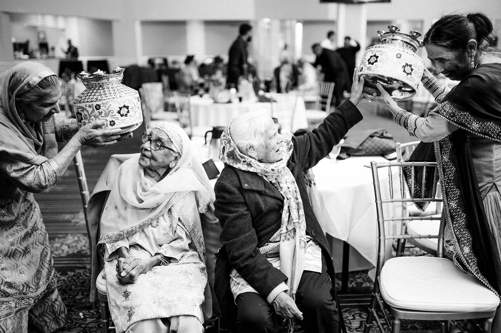 Old ladies socialize at a jagoo party in surrey BC 