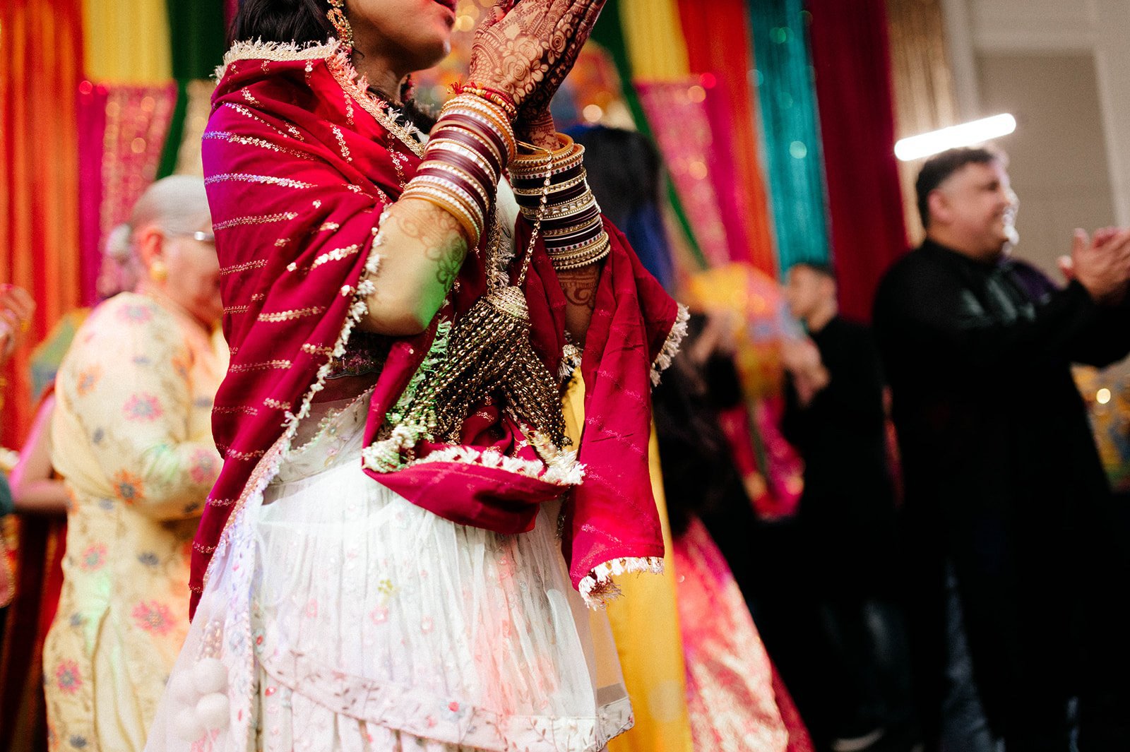 A close up of a bride dancing at her jagoo ceremony in surrey BC 