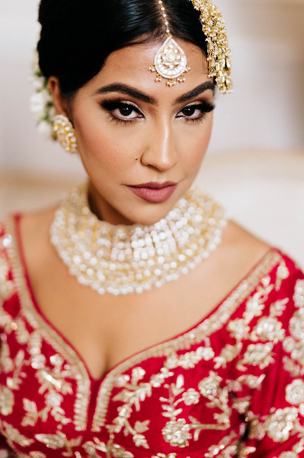 An indian bride pouts for a photo on her wedding morning in Surrey, BC 