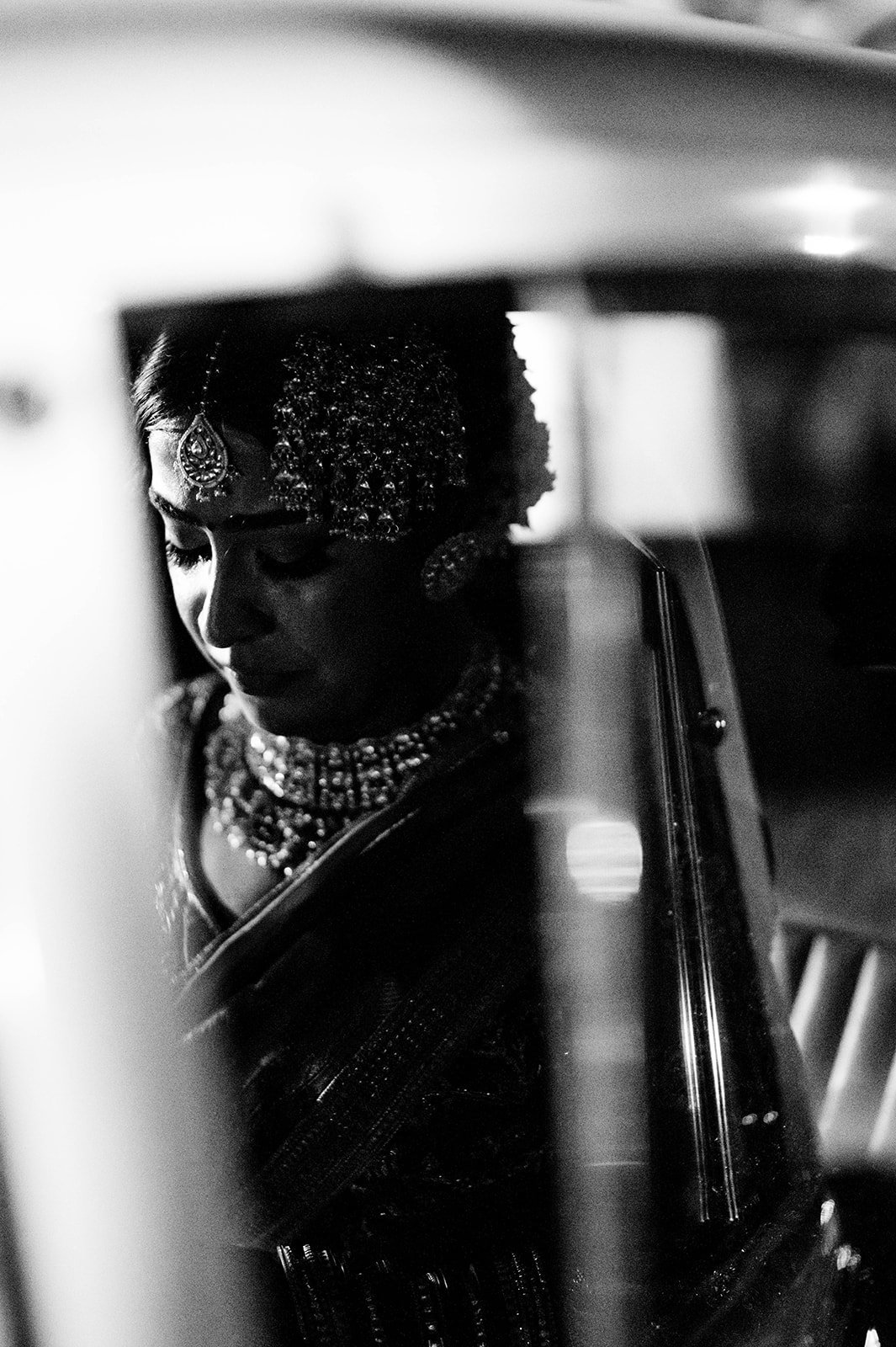 An indian bride cries as she leaves her home in a doli ceremony in Surrey BC.