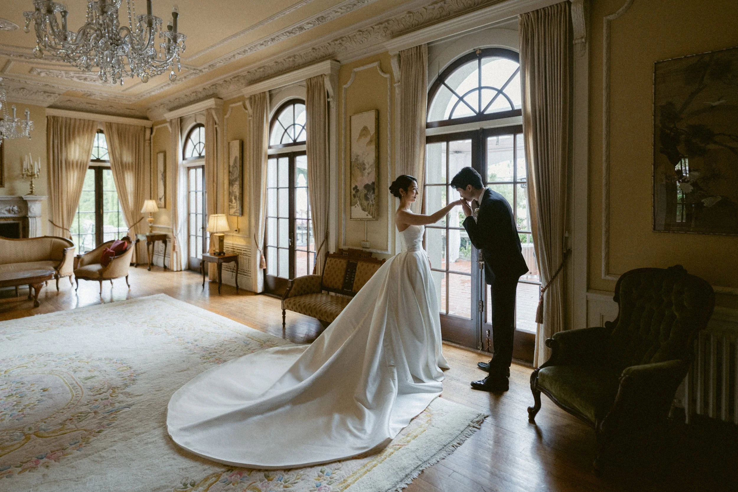 Bride and groom sharing a quiet moment inside Hycroft Manor.