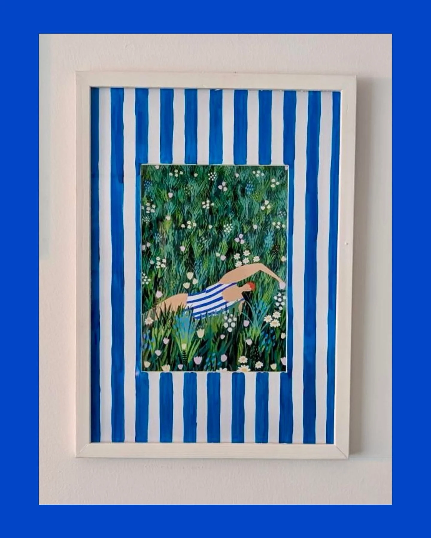 Obsessed with how @explorewithmarion styled my &lsquo;Field Swimming&rsquo; print with a blue striped mount 😍 let this be your reminder that you can be creative with frames and mounts and it can add so much to the art and to your space 💙