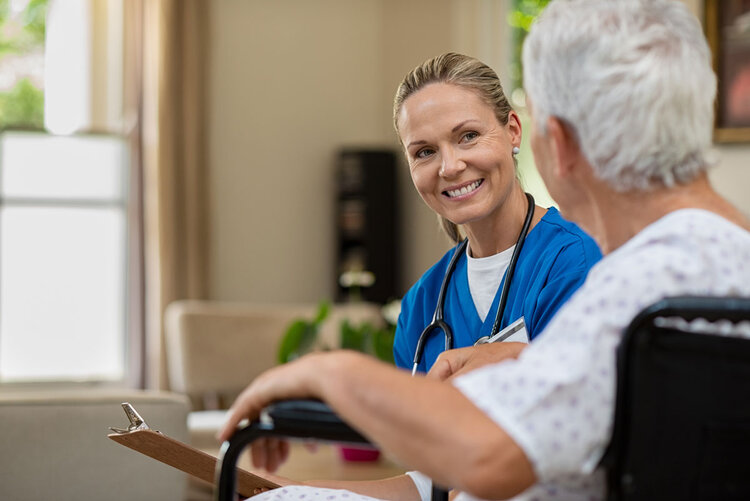 A patient and staff member at Bloom at Lakewood.