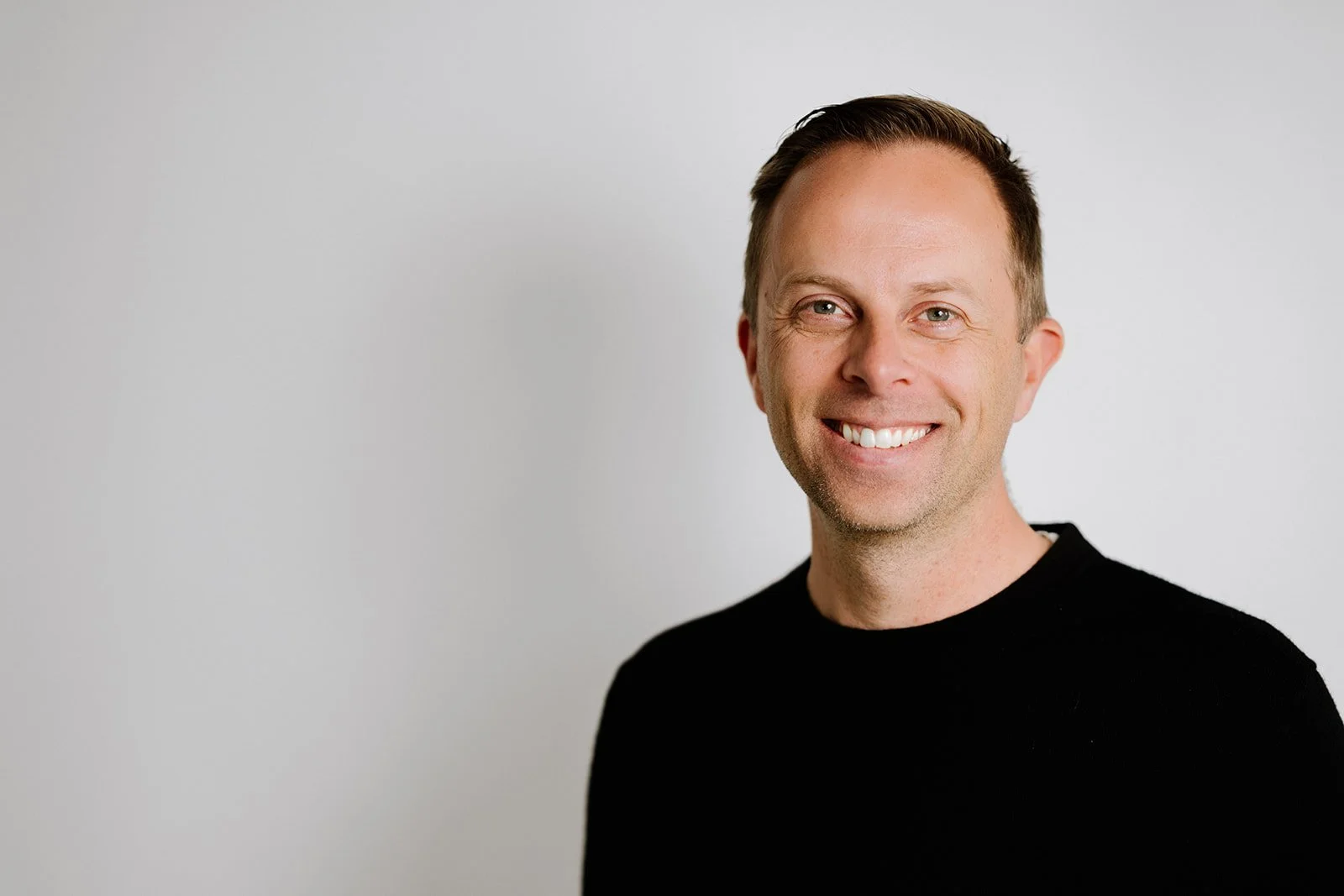 Natural headshot of man on white background