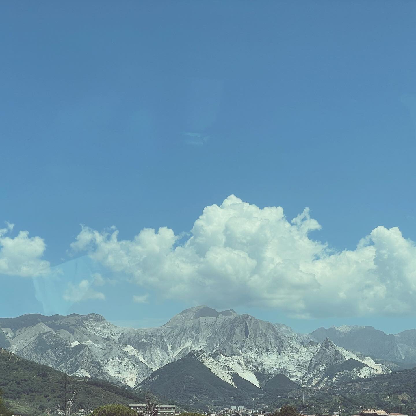 Snow? Not quite. These are the Apuan Alps- otherwise known as the mountains of Carrara. More marble has been produced from these mountain ranges than anywhere else in the world. 

.
.
.
.
.
.
#italy #travelgram #travelitaly #travel #design #interiors