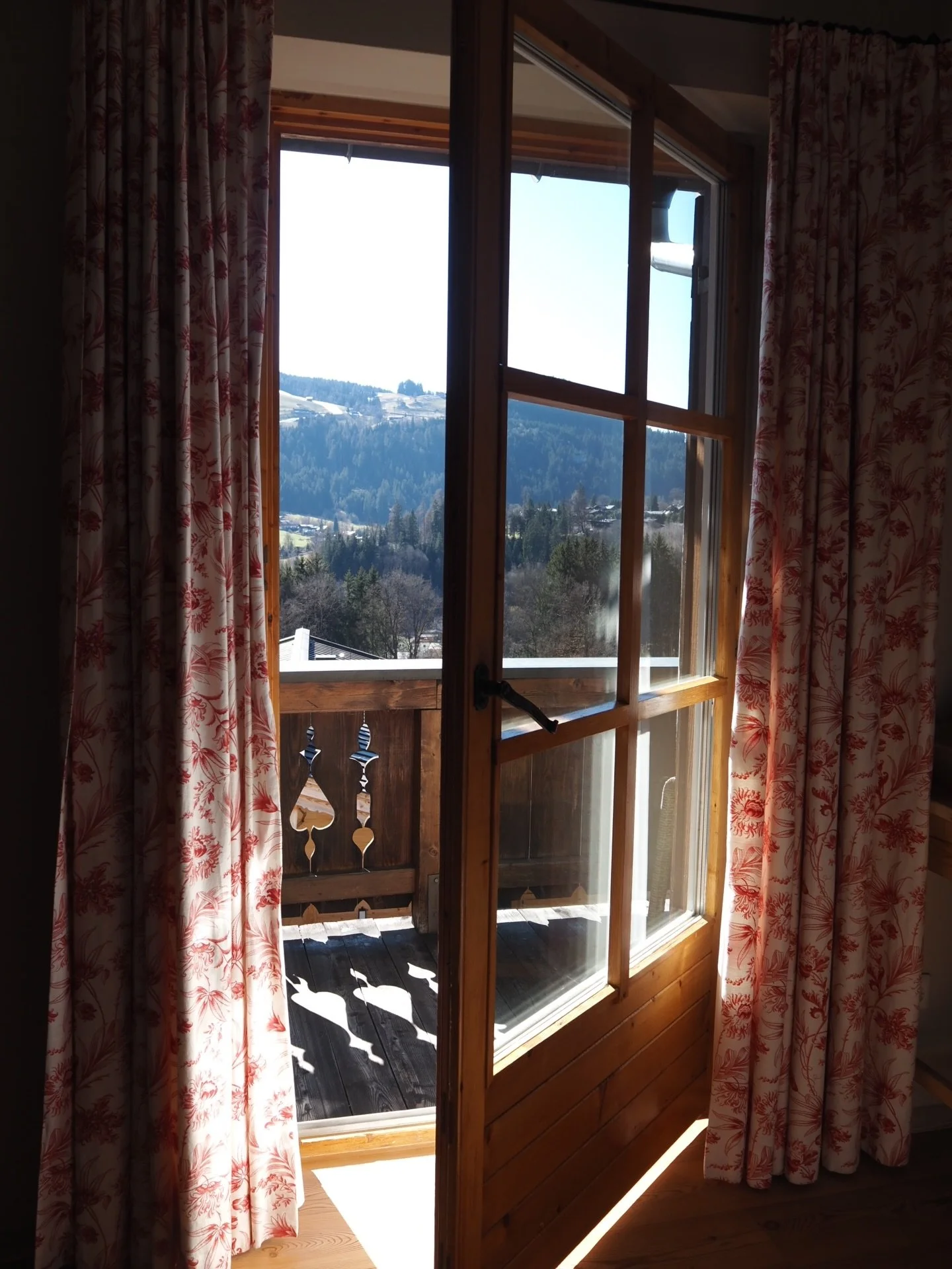 Looking back at our trip to Austria earlier this year, I&rsquo;m realising why it felt so wonderfully Christmasy all along &mdash; rooms were wrapped in rich colour, so often deep reds and forest greens, as if the country were quietly celebrating the