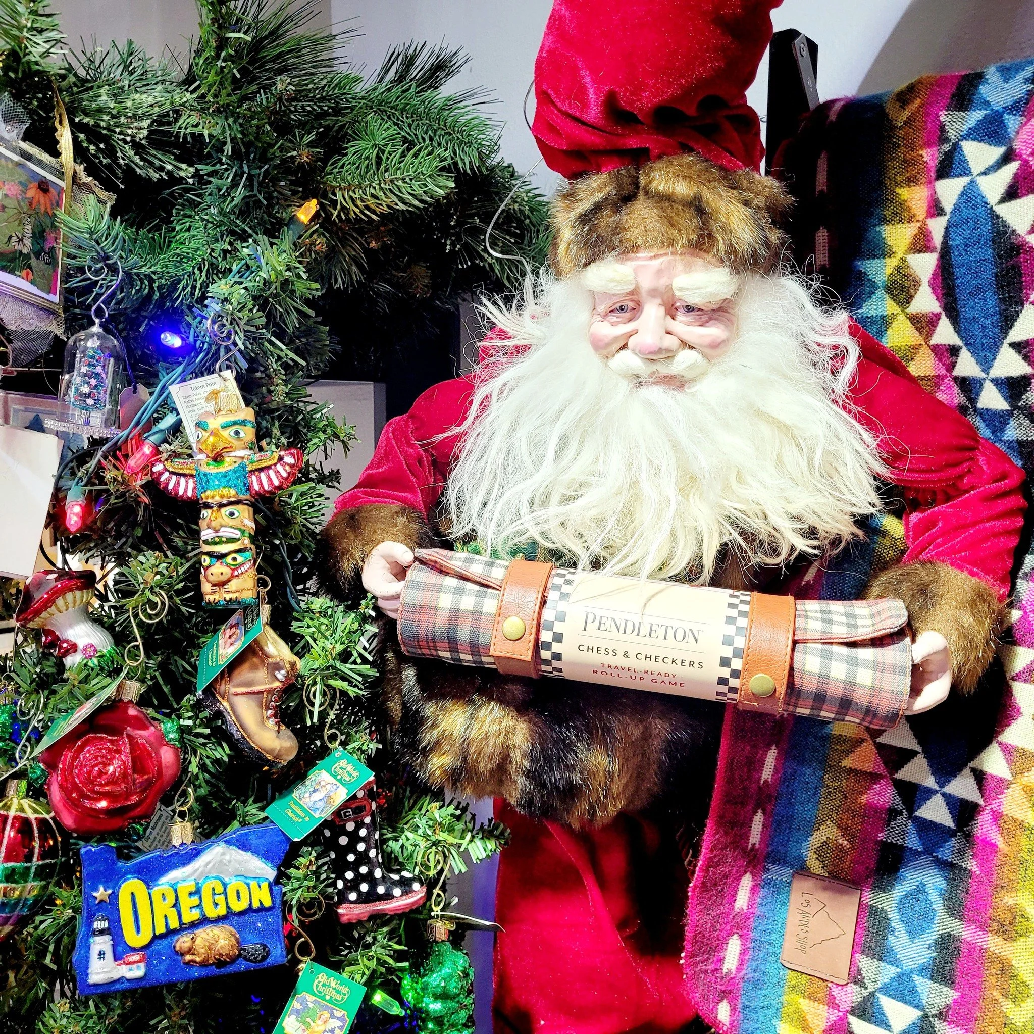 It’s officially Christmas at A Framer's Touch! 🎄 
Some of you think it's too early.... while others have been asking where our ornaments were for weeks!! Either way—all 22 trees are twinkling, our local artists’ ornaments are up, a