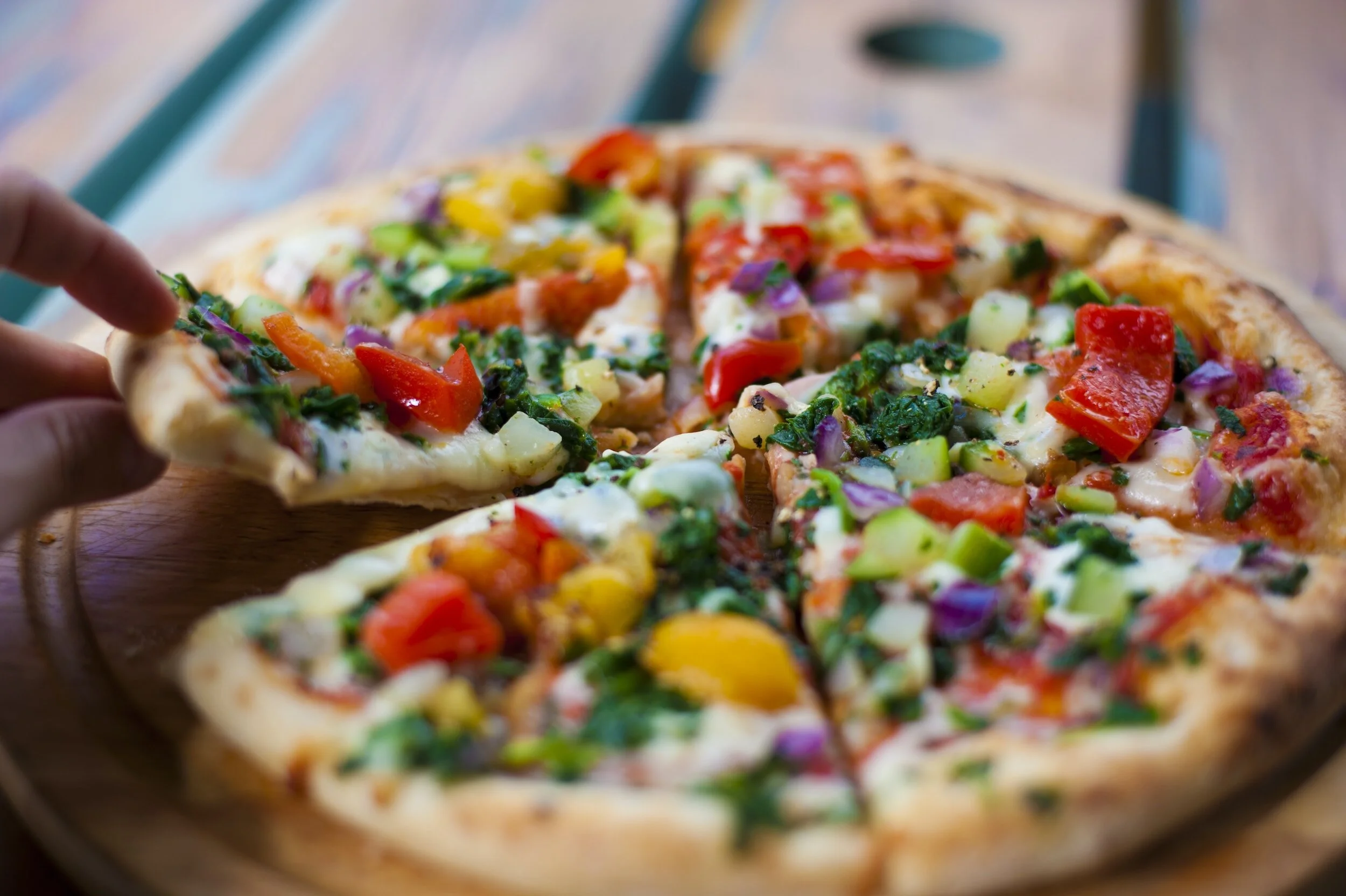 A pizza loaded up with fresh veggies